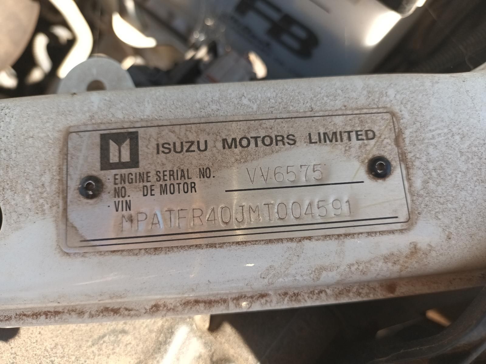A White Isuzu Motors Limited Engine Serial Number — South West 4WD Wreckers in Harristown, QLD