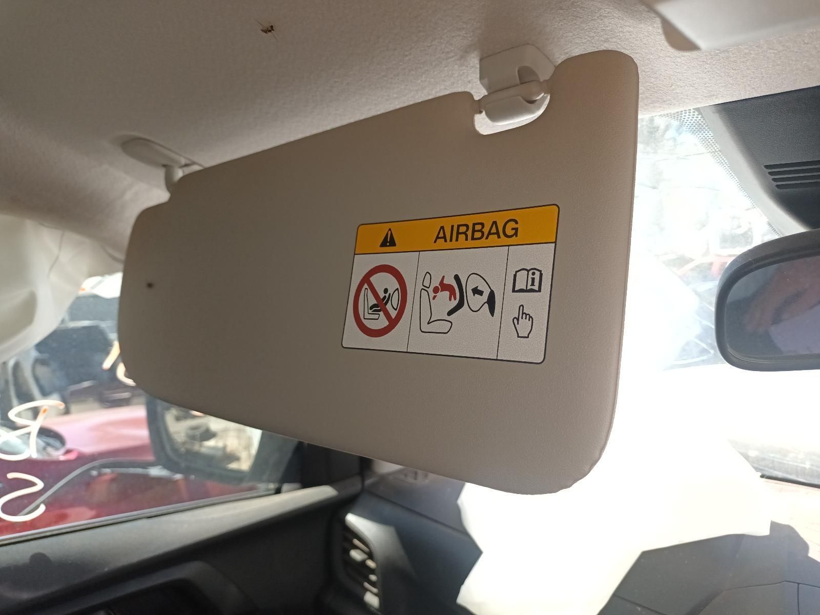 A Sun Visor with a Warning Sign on It That Says Airbag — South West 4WD Wreckers in Harristown, QLD