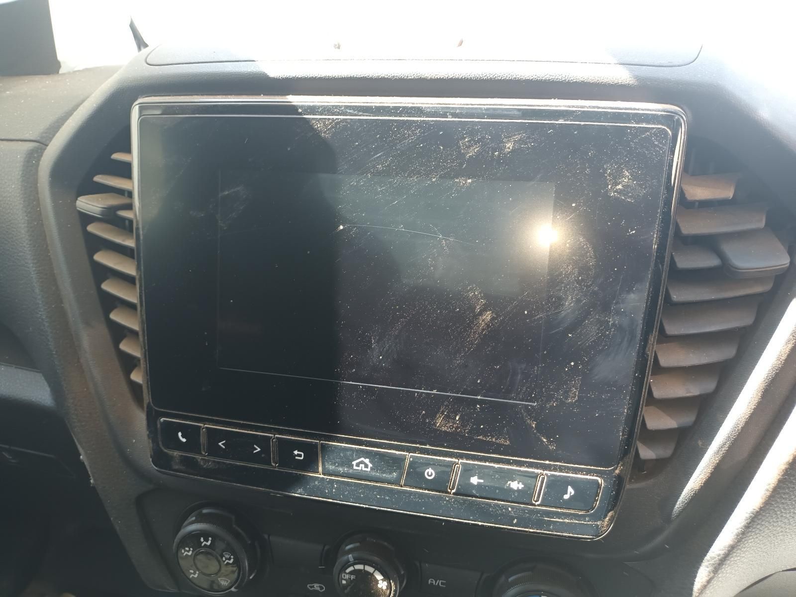 A Dirty Car Radio is Sitting on the Dashboard — South West 4WD Wreckers in Harristown, QLD