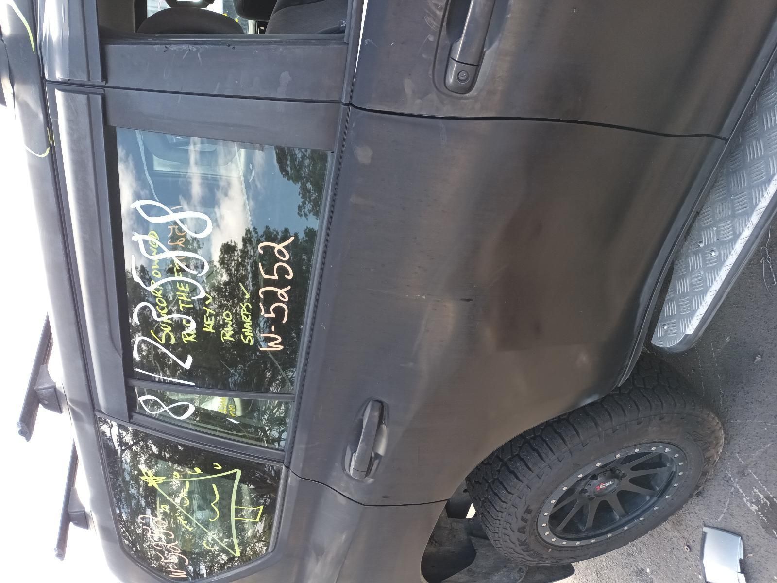 A Black Car with a Words Written on the Door — South West 4WD Wreckers In Brisbane, QLD