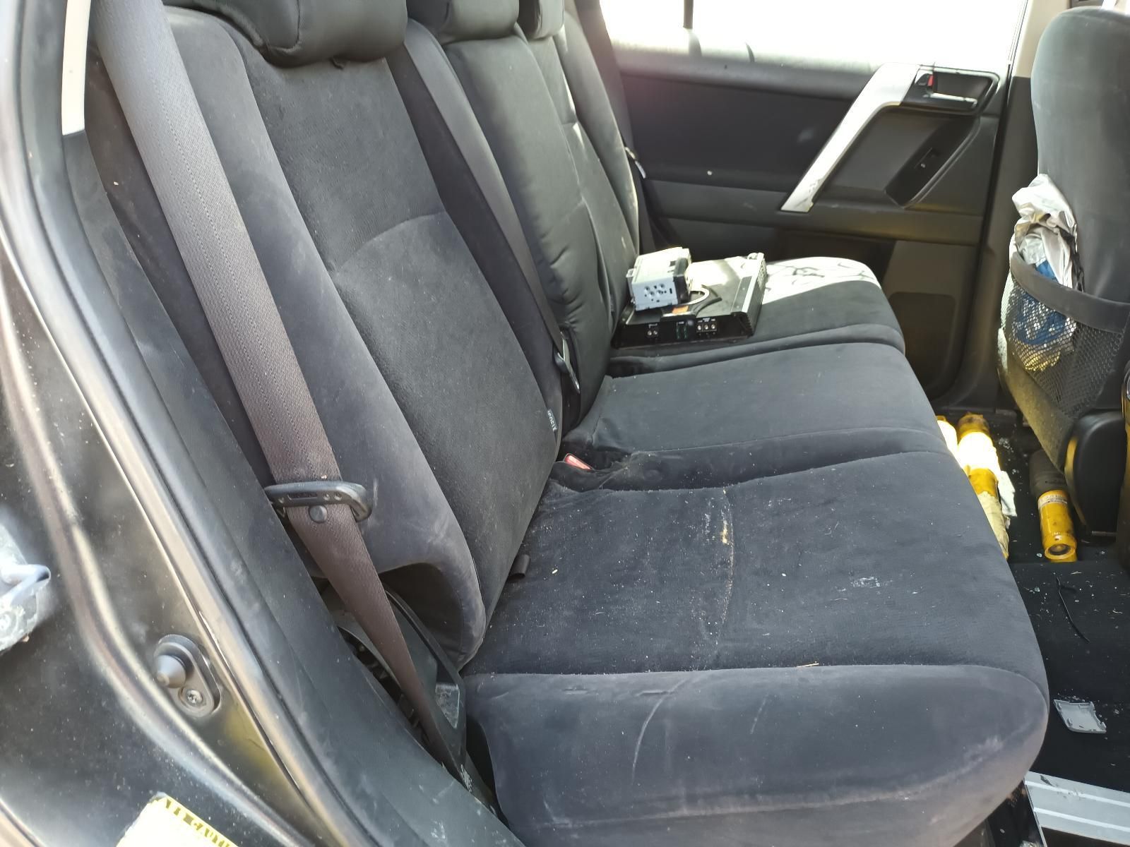 The Back Seat of a Car with a Yellow Bottle on the Floor — South West 4WD Wreckers In Brisbane, QLD