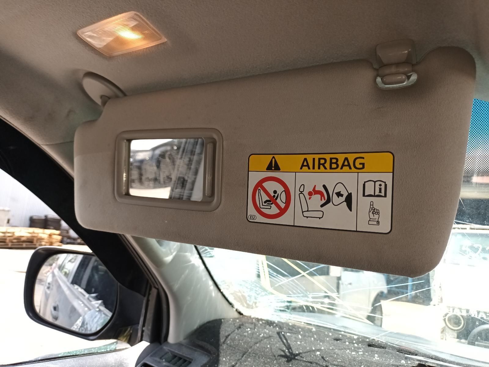 A Car with a Sun Visor and a Warning Sign That Says Airbag — South West 4WD Wreckers In Brisbane, QLD