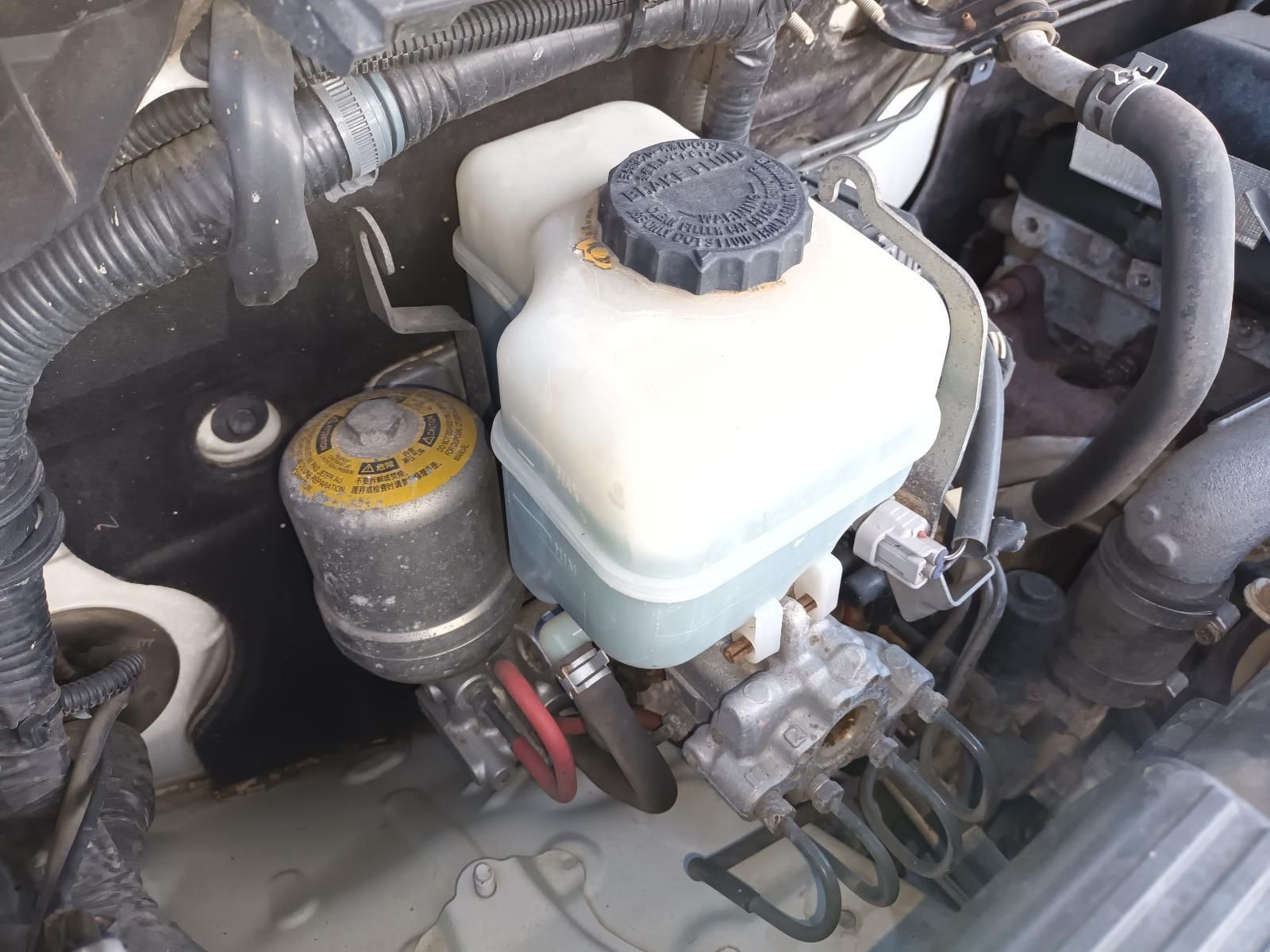A Close Up of a Brake Fluid Tank in a Car — South West 4WD Wreckers In Brisbane, QLD