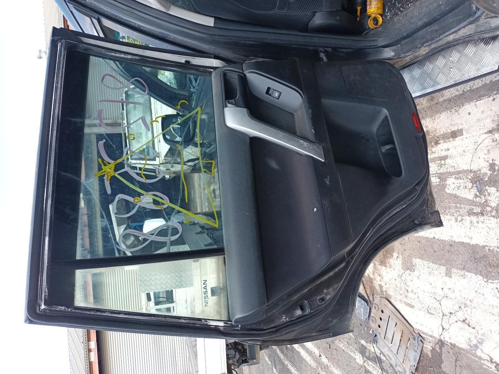 The Back Door of a Black Car with the Door Open — South West 4WD Wreckers In Brisbane, QLD