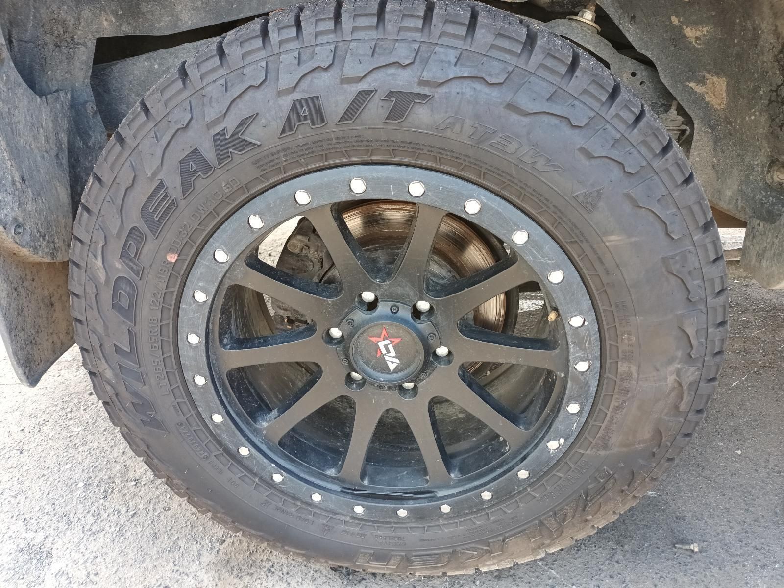 A Close Up of a Tire on a Car with a Black Rim— South West 4WD Wreckers In Brisbane, QLD