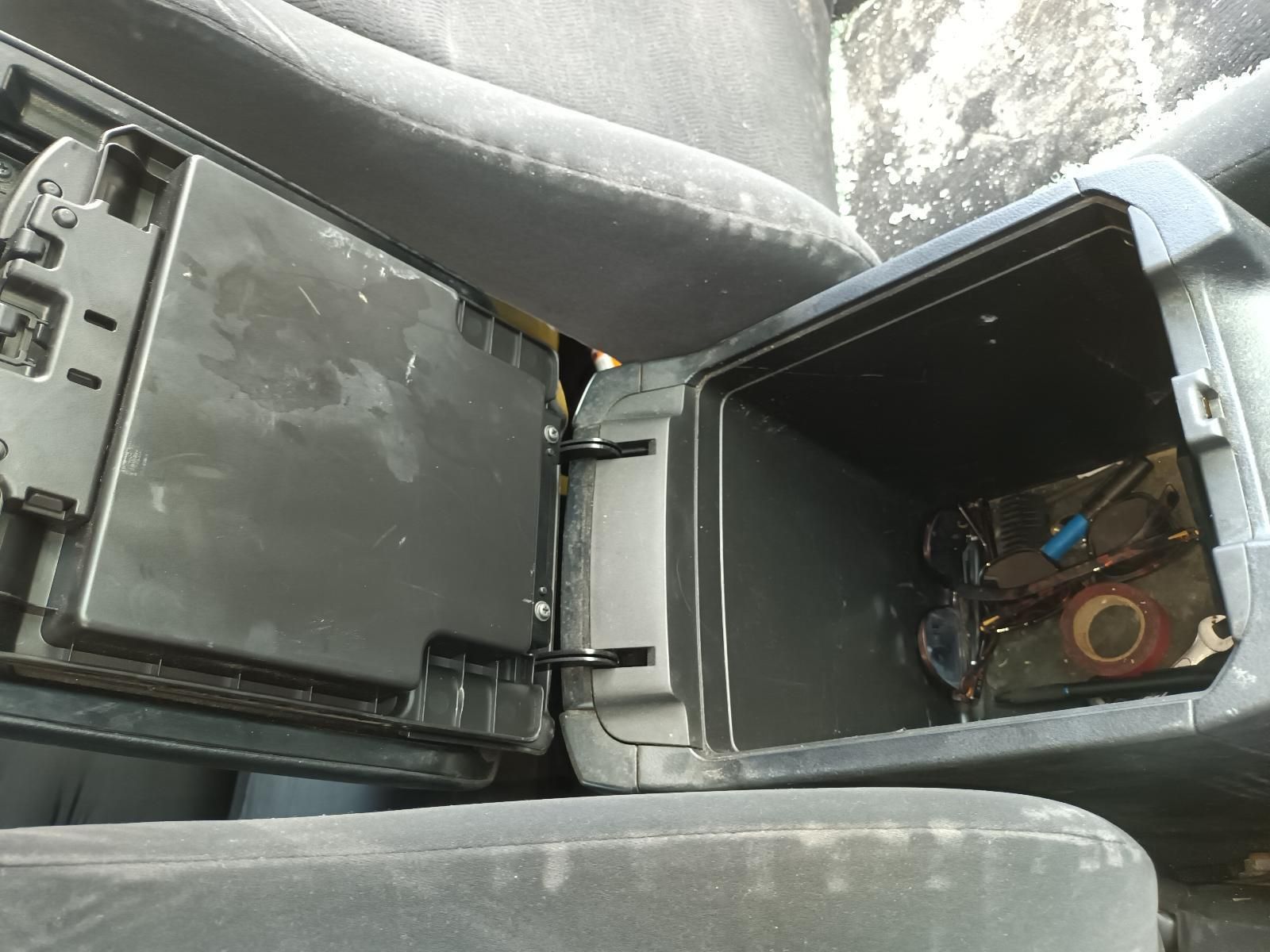 A Car Console with the Lid Open and a Box Inside of It — South West 4WD Wreckers In Brisbane, QLD