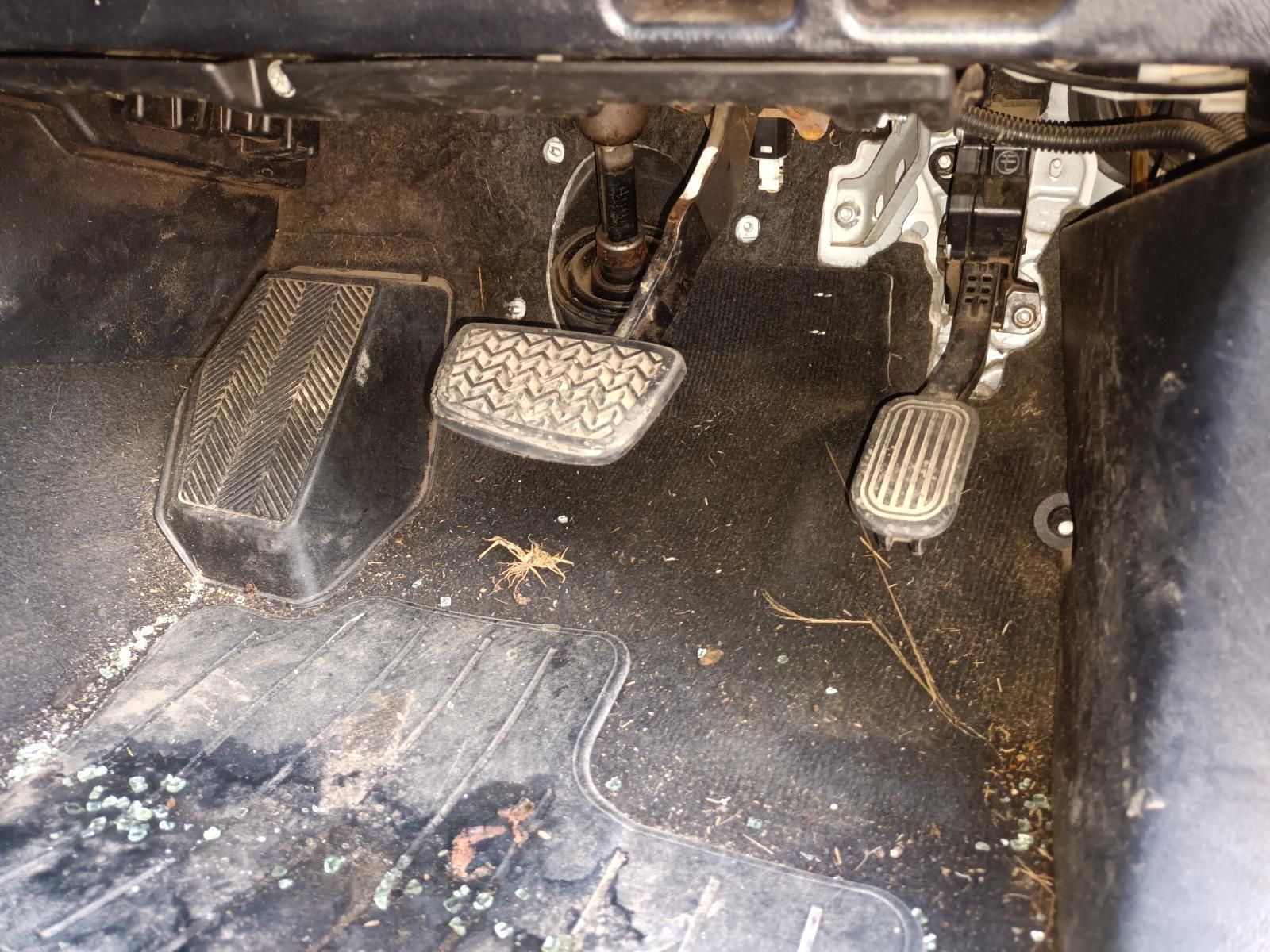 The Inside of a Car with a Dirty Floor and a Dirty Pedal — South West 4WD Wreckers In Brisbane, QLD