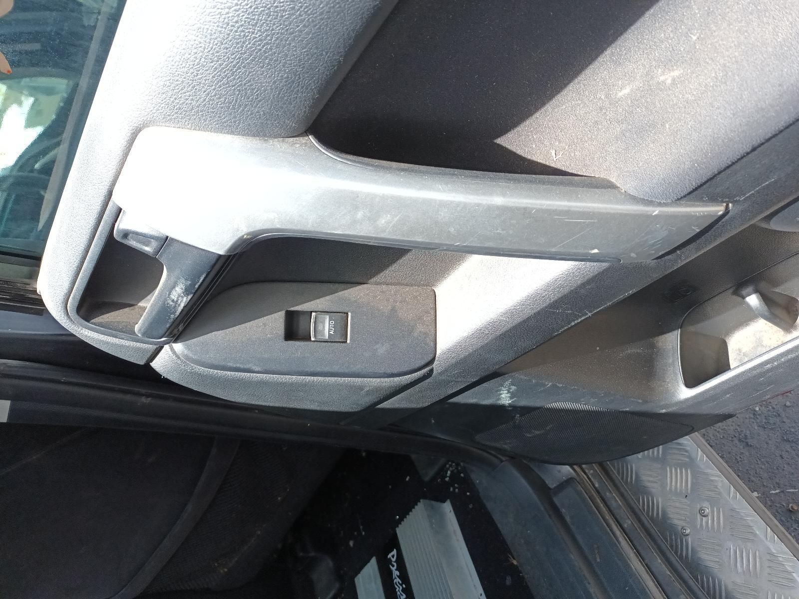 A Close Up of a Car Door Handle with a Button on It — South West 4WD Wreckers In Brisbane, QLD