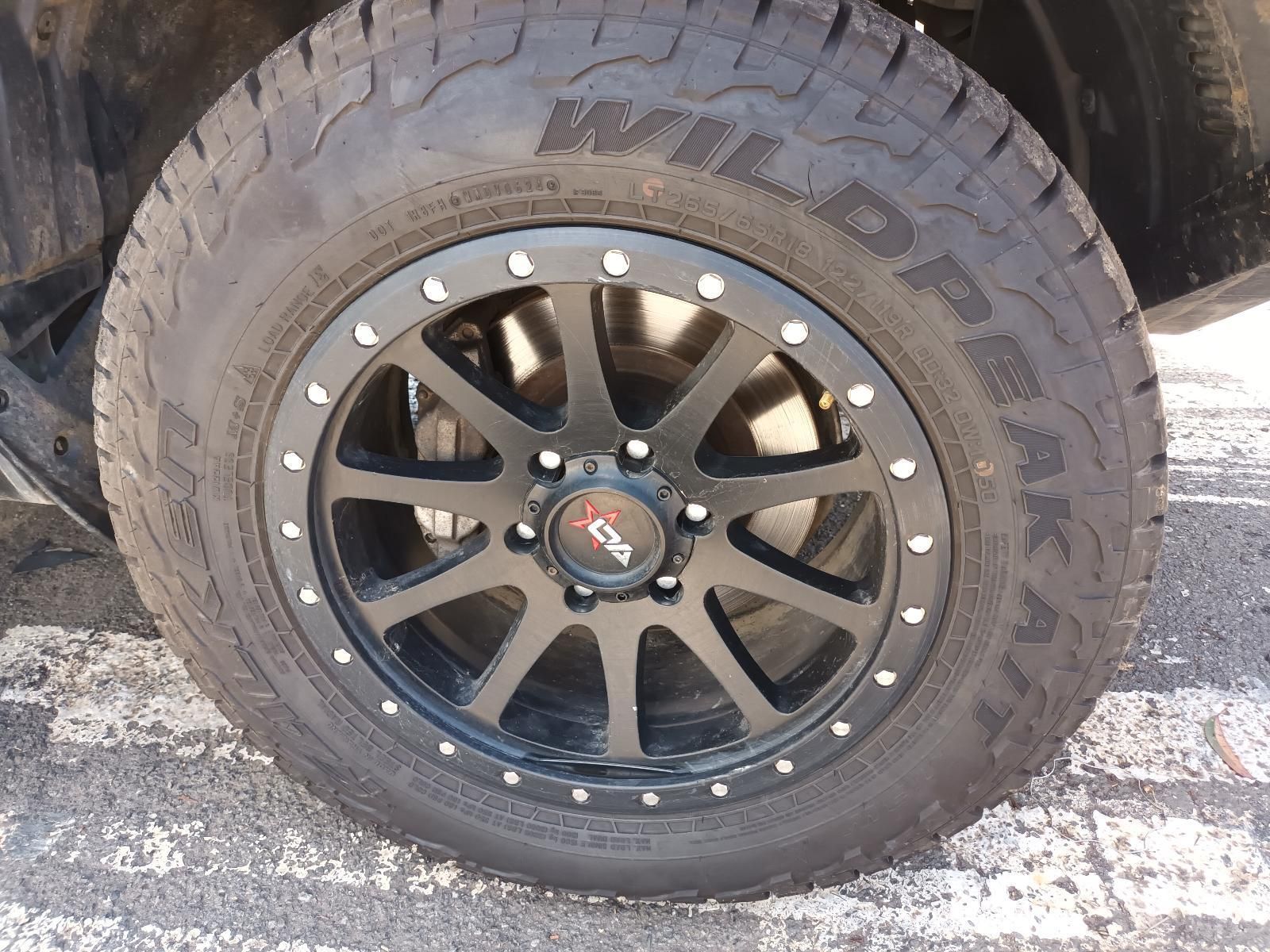 A Close Up of a Wildpeak Tire on a Black Wheel — South West 4WD Wreckers In Brisbane, QLD