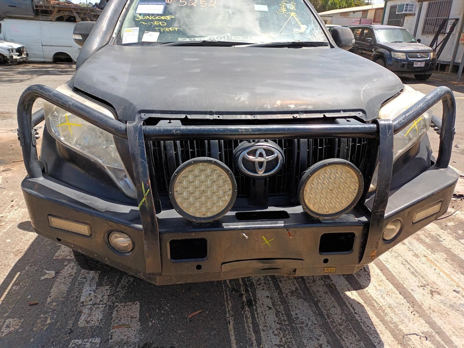 A Black Toyota Truck is Parked in a Parking Lot — South West 4WD Wreckers In Brisbane, QLD