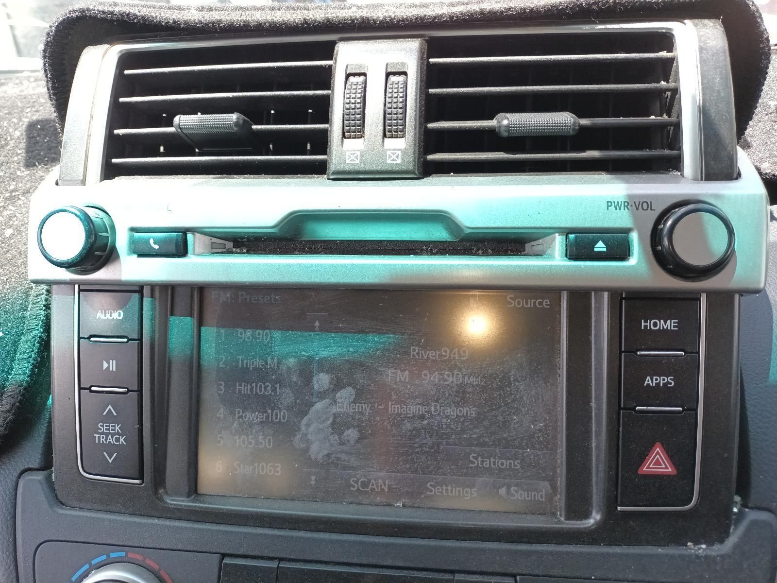 A Car Radio is Sitting on the Dashboard of a Car — South West 4WD Wreckers In Brisbane, QLD
