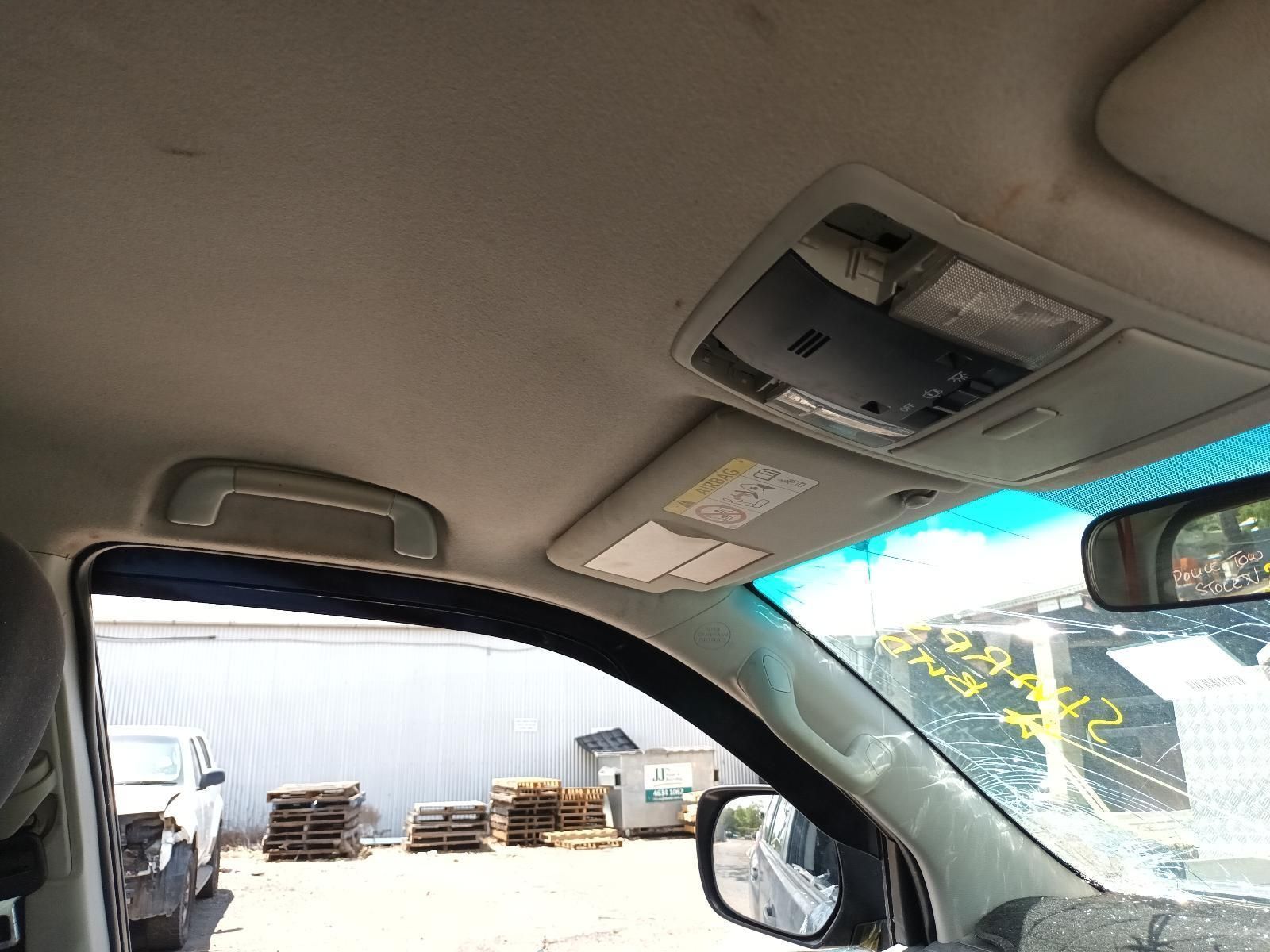The Inside of a Car with a Roof Light and a Rear View Mirror — South West 4WD Wreckers In Brisbane, QLD