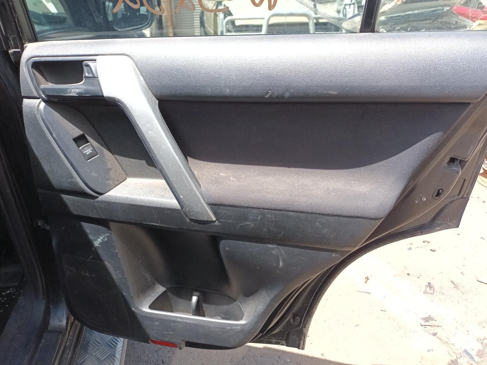 The Back Door of a Black Car with the Door Open — South West 4WD Wreckers In Brisbane, QLD