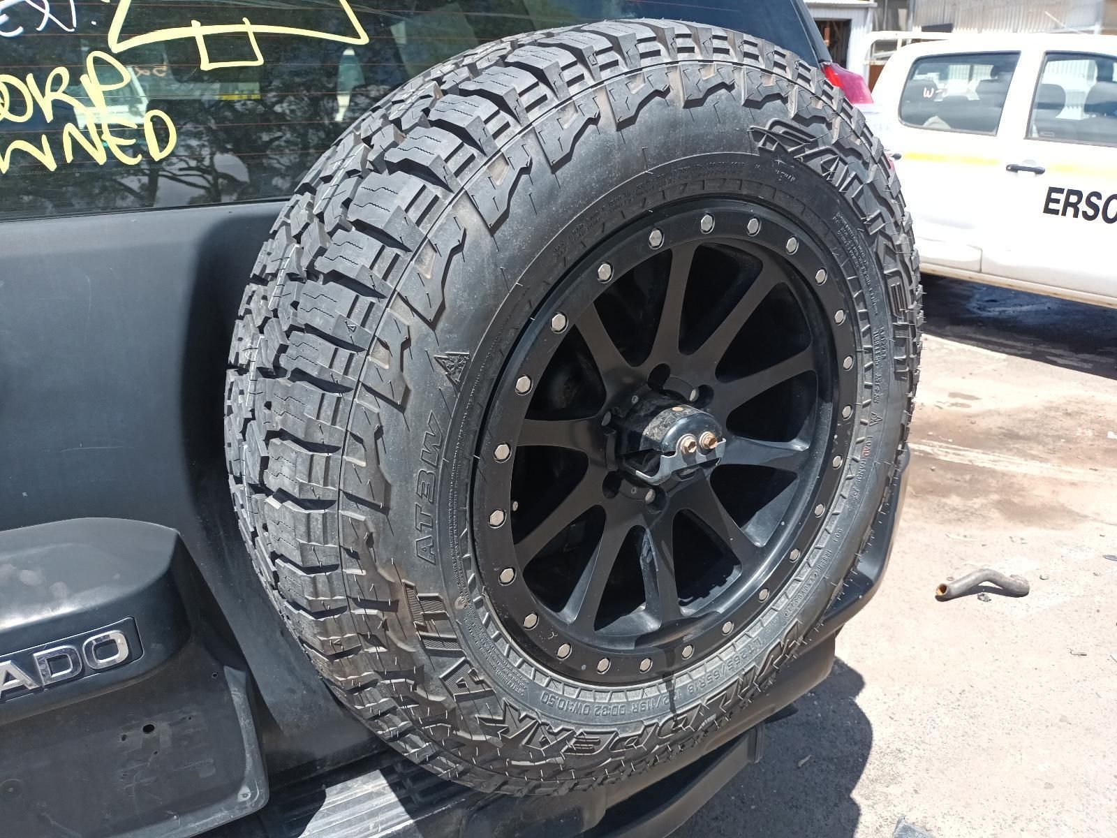 A Jeep with a Spare Tire on the Back of It — South West 4WD Wreckers In Brisbane, QLD