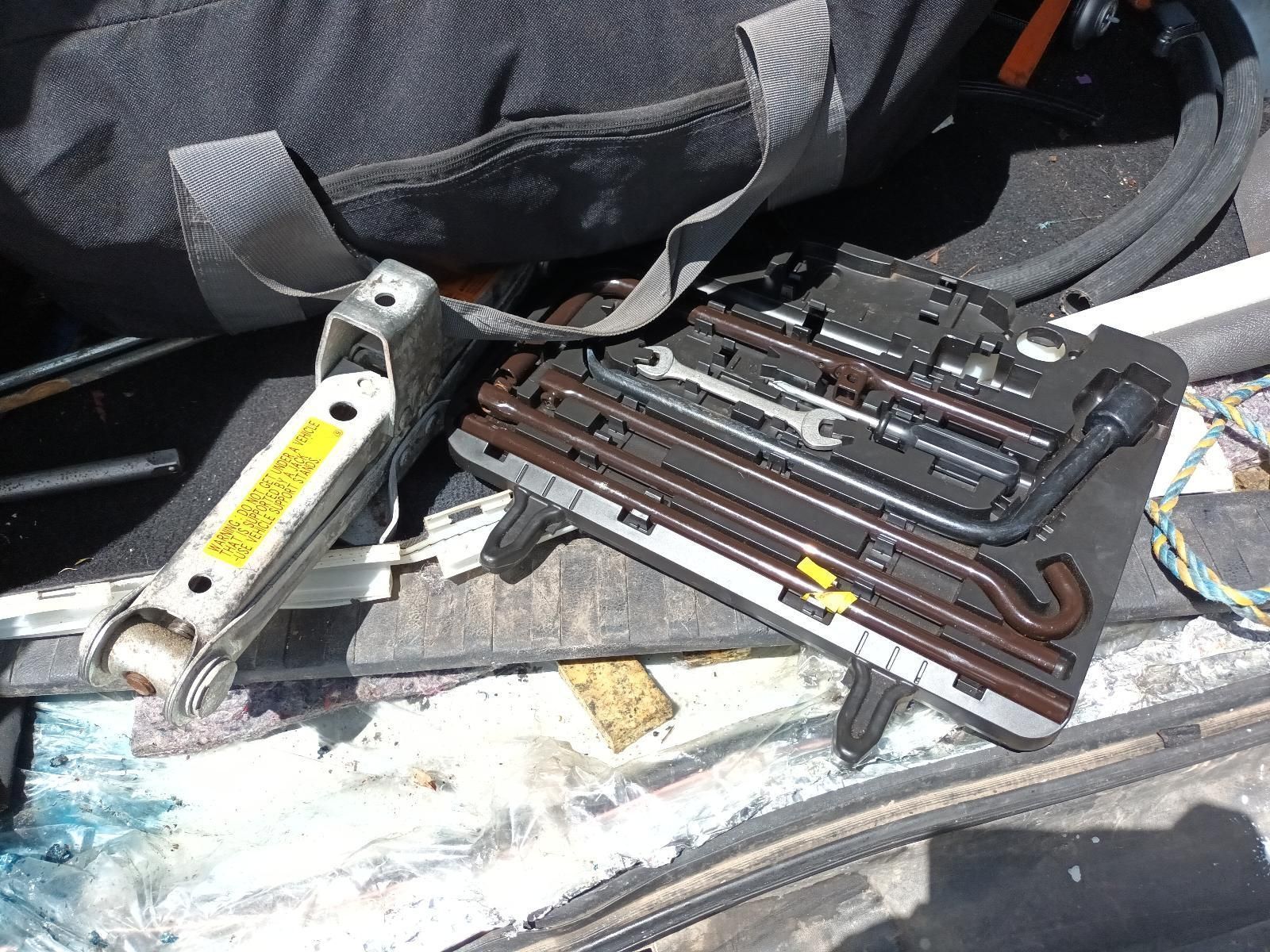 A Set of Tools Sitting on Top of a Car Trunk — South West 4WD Wreckers In Brisbane, QLD