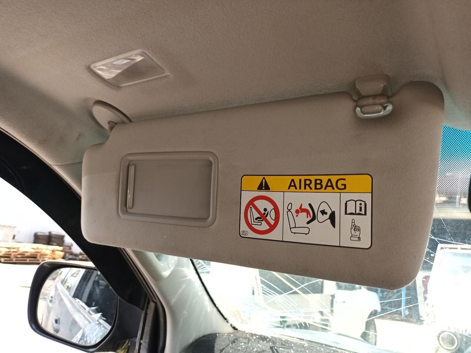 A Close Up of a Sun Visor in a Car with a Warning Sticker on It — South West 4WD Wreckers In Brisbane, QLD
