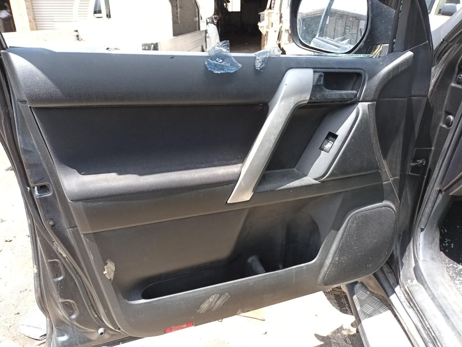 The Door of a Black Car with the Door Open — South West 4WD Wreckers In Brisbane, QLD