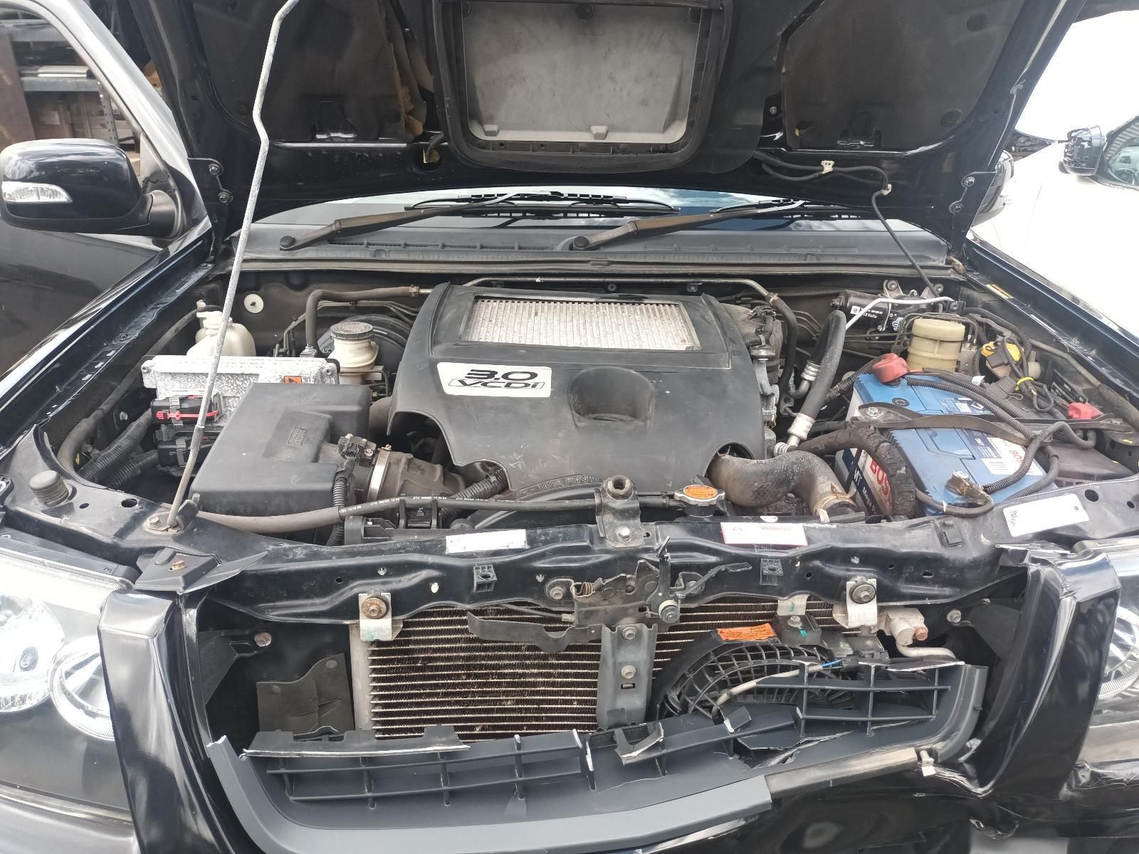 The Hood of a Car is Open and the Engine is Visible — South West 4WD Wreckers In Brisbane, QLD