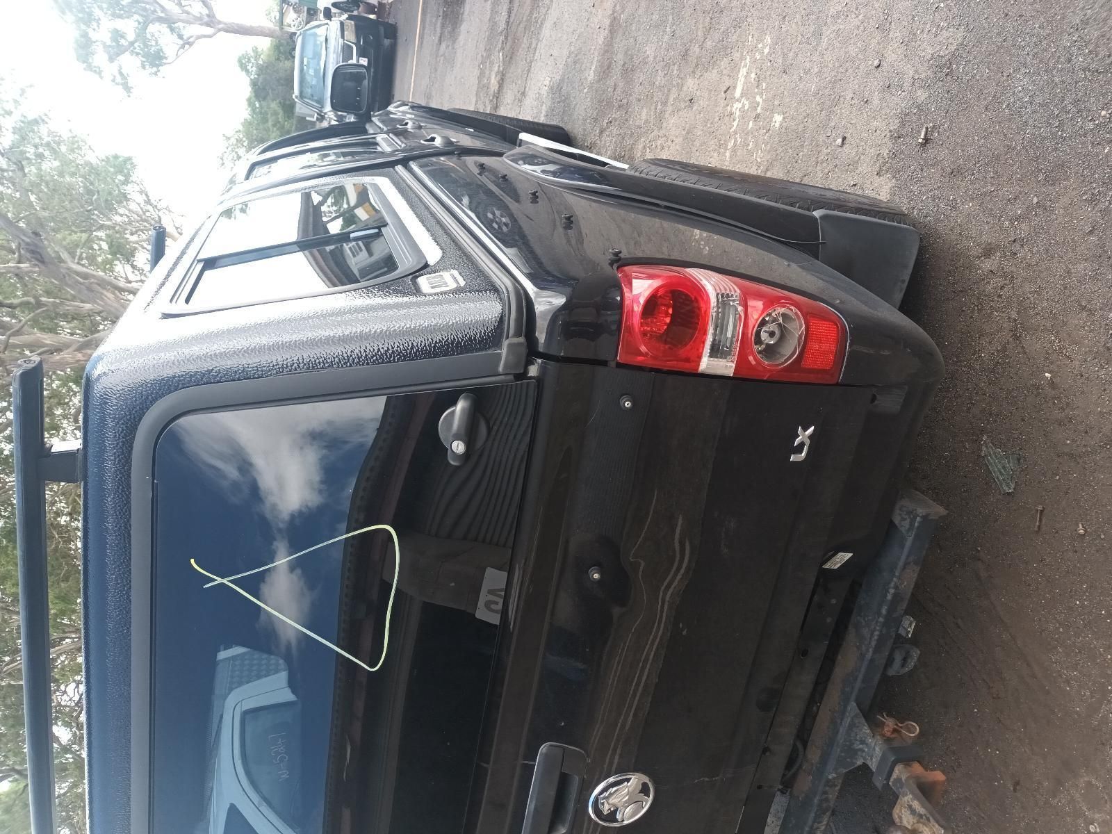 A Black Truck is Parked on the Side of the Road — South West 4WD Wreckers In Brisbane, QLD