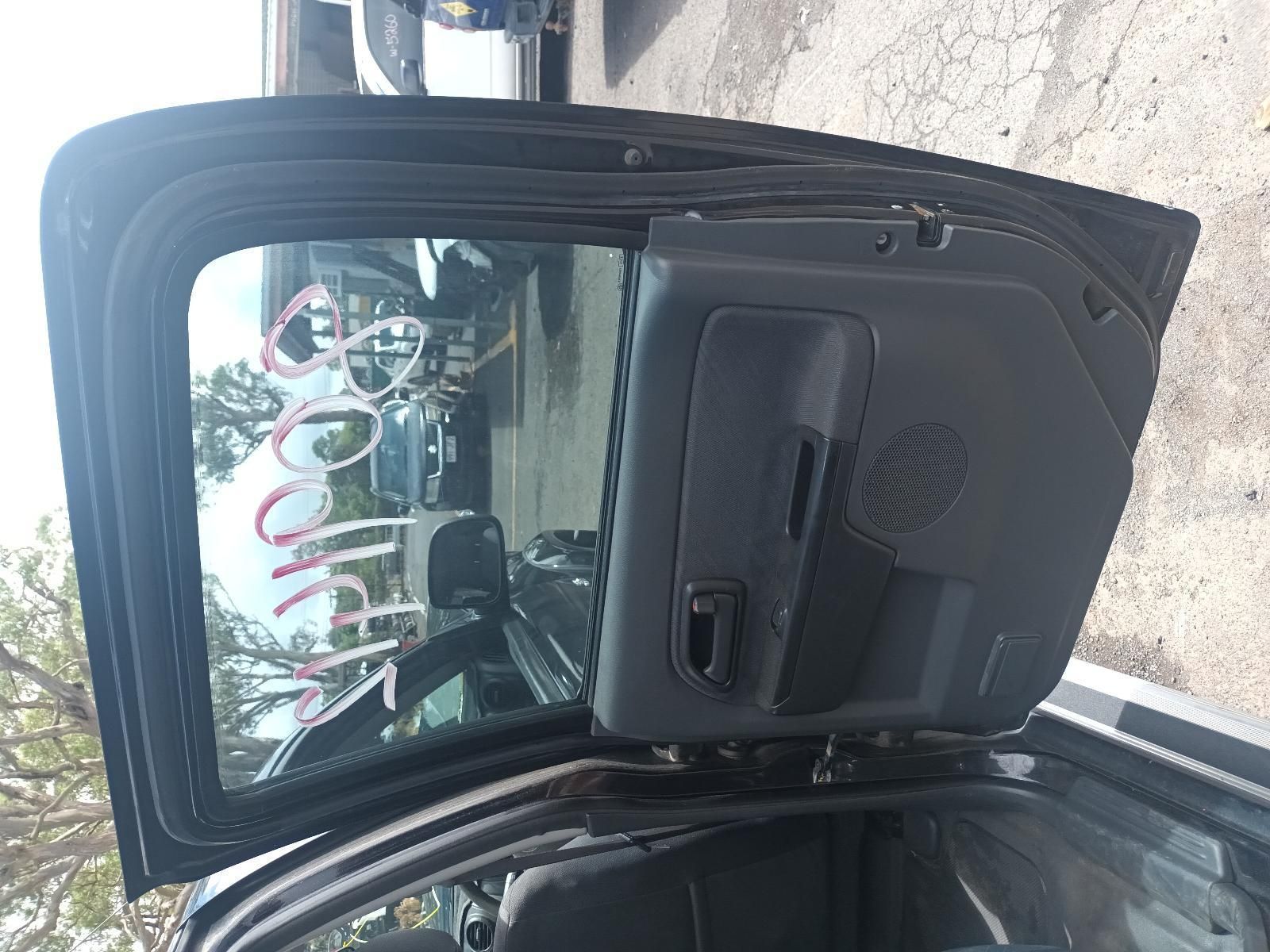 The Back Door of a Car is Open — South West 4WD Wreckers In Brisbane, QLD