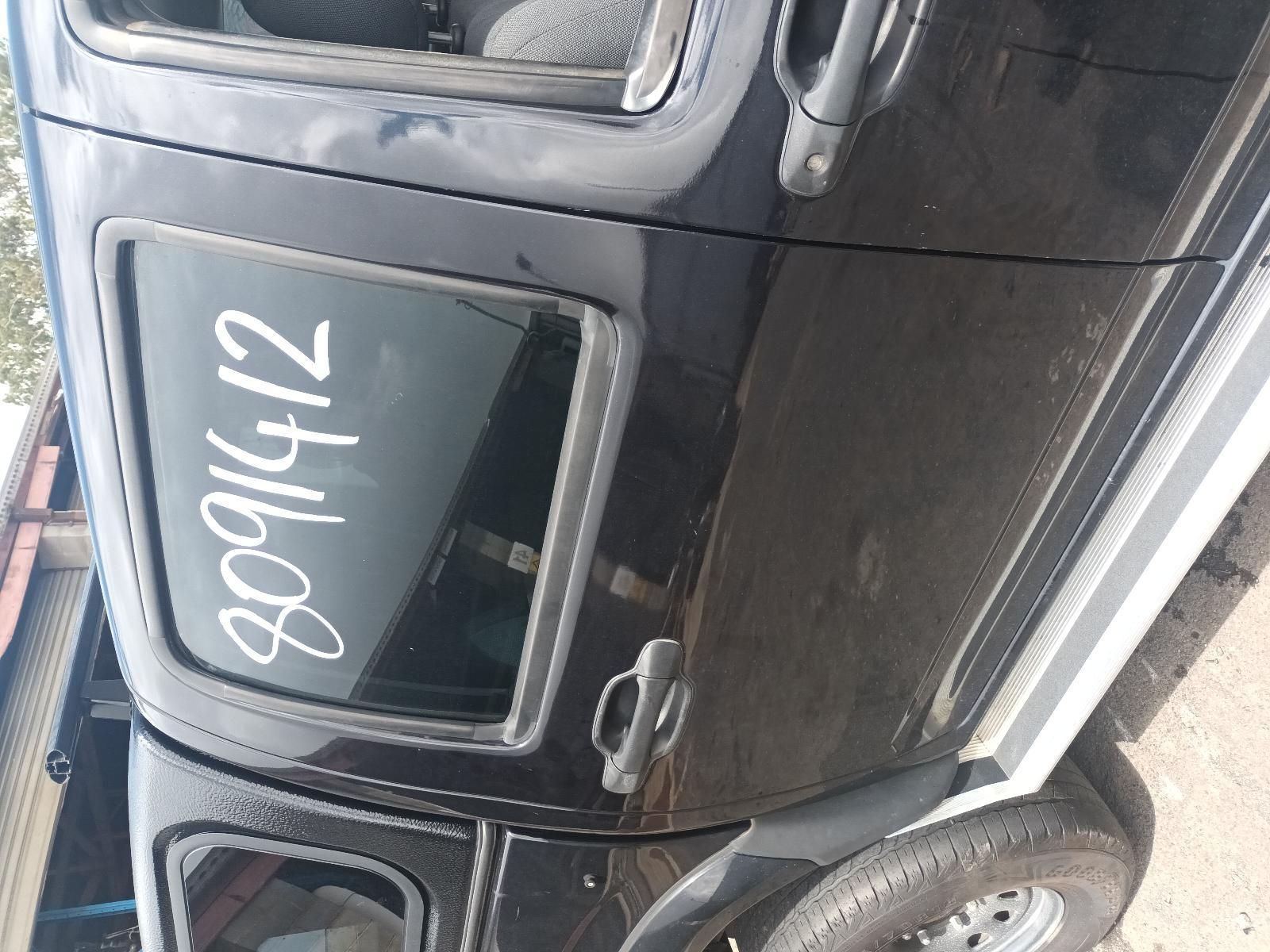 A Black Car with the Numbers on the Window — South West 4WD Wreckers In Brisbane, QLD