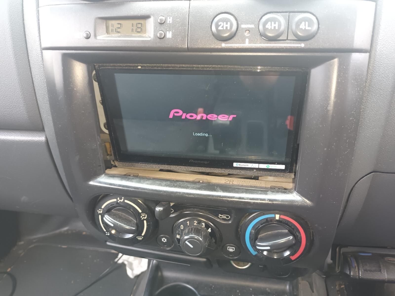 The Pioneer Radio is Being Removed from the Dashboard of a Car — South West 4WD Wreckers In Brisbane, QLD