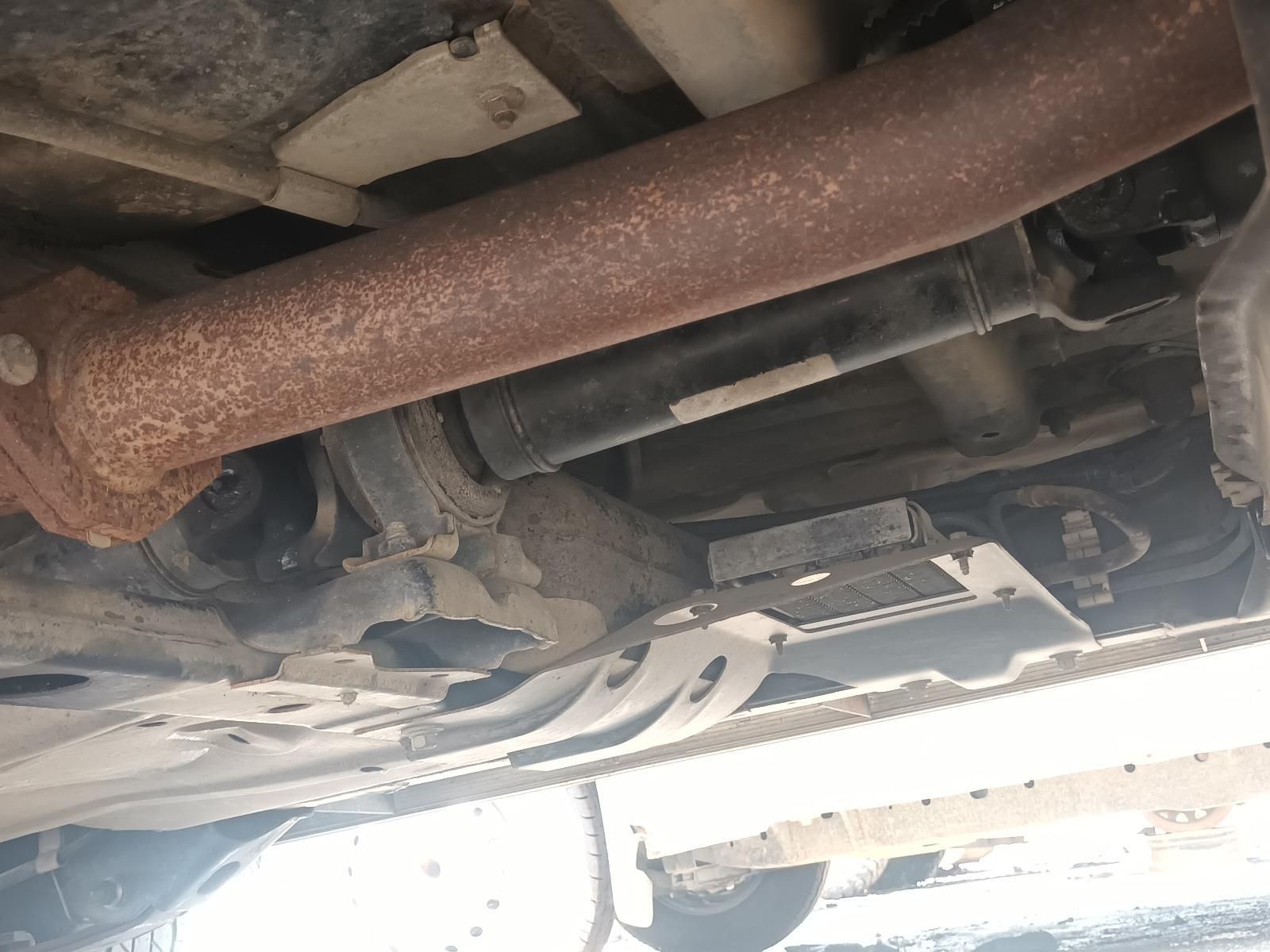 A Close Up of the Underside of a Car with a Rusty Pipe — South West 4WD Wreckers In Brisbane, QLD