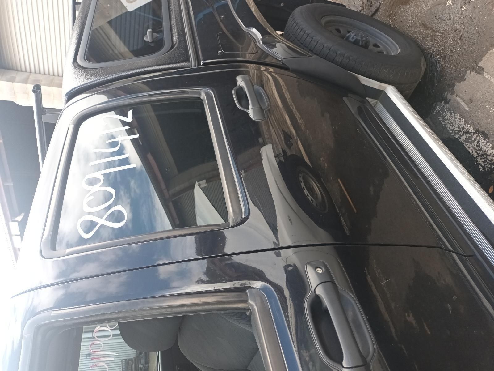 A Black Truck is Parked on the Side of the Road — South West 4WD Wreckers In Brisbane, QLD