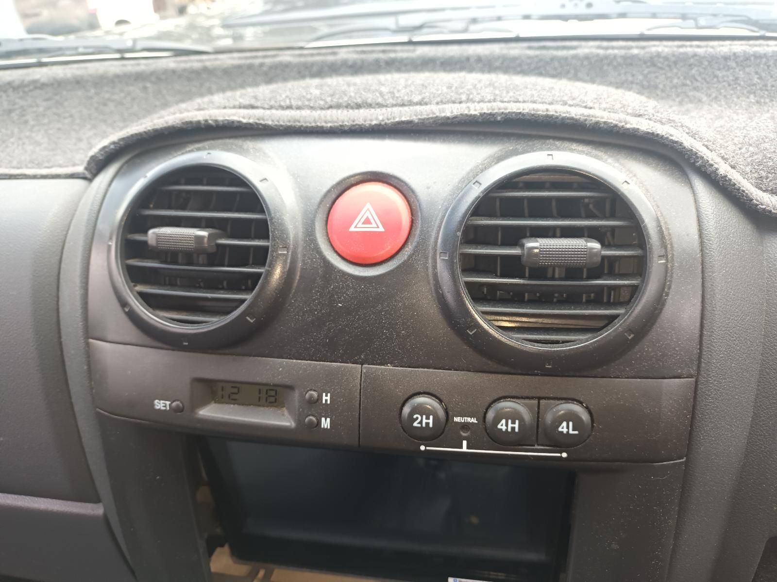 A Close Up of the Dashboard of a Car with a Red Warning Light — South West 4WD Wreckers In Brisbane, QLD