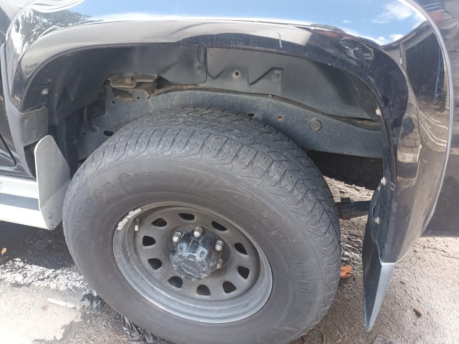 A Close Up of a Tire on a Black Truck — South West 4WD Wreckers In Brisbane, QLD