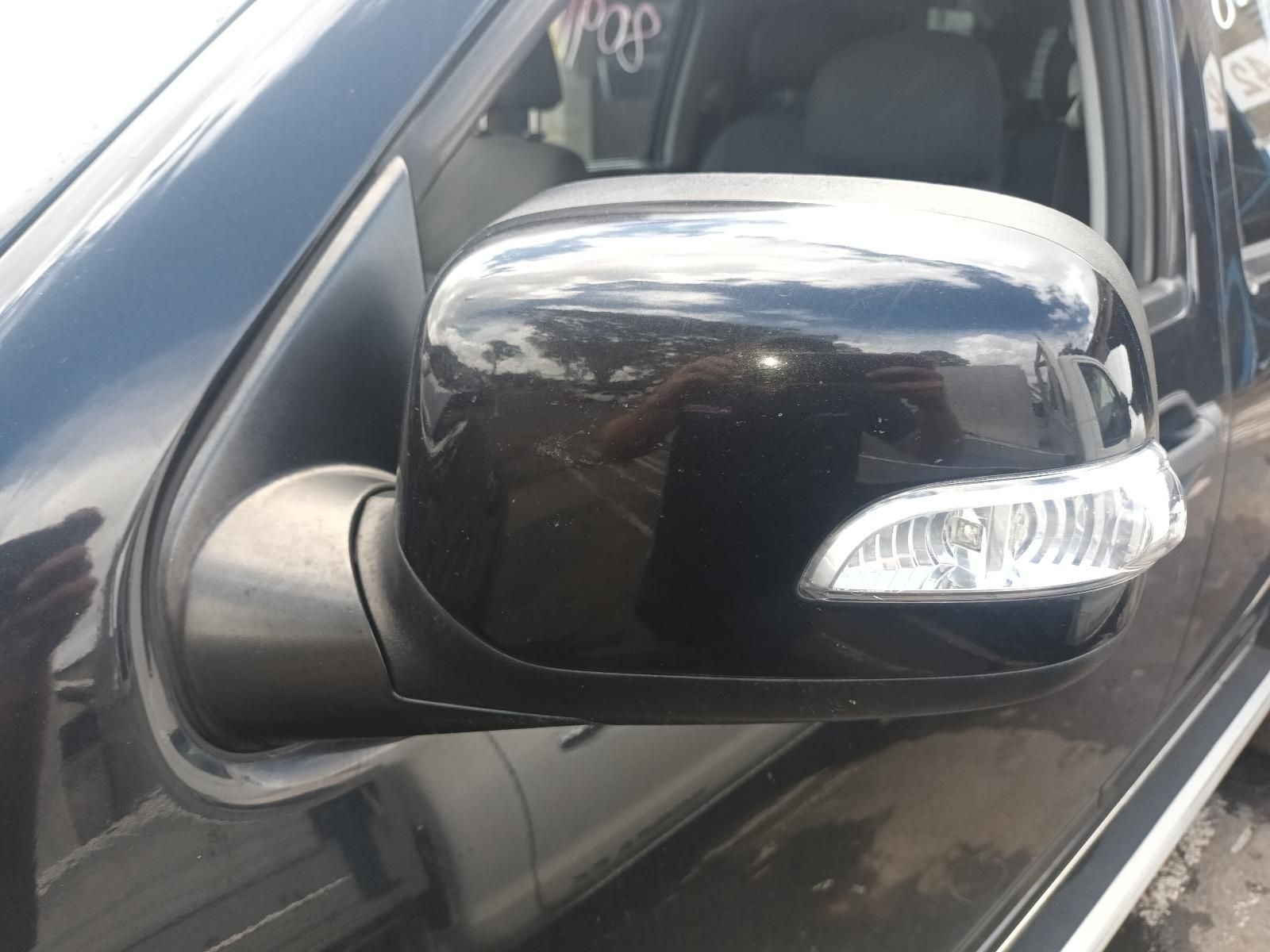 A Close Up of a Side View Mirror on a Black Car — South West 4WD Wreckers In Brisbane, QLD