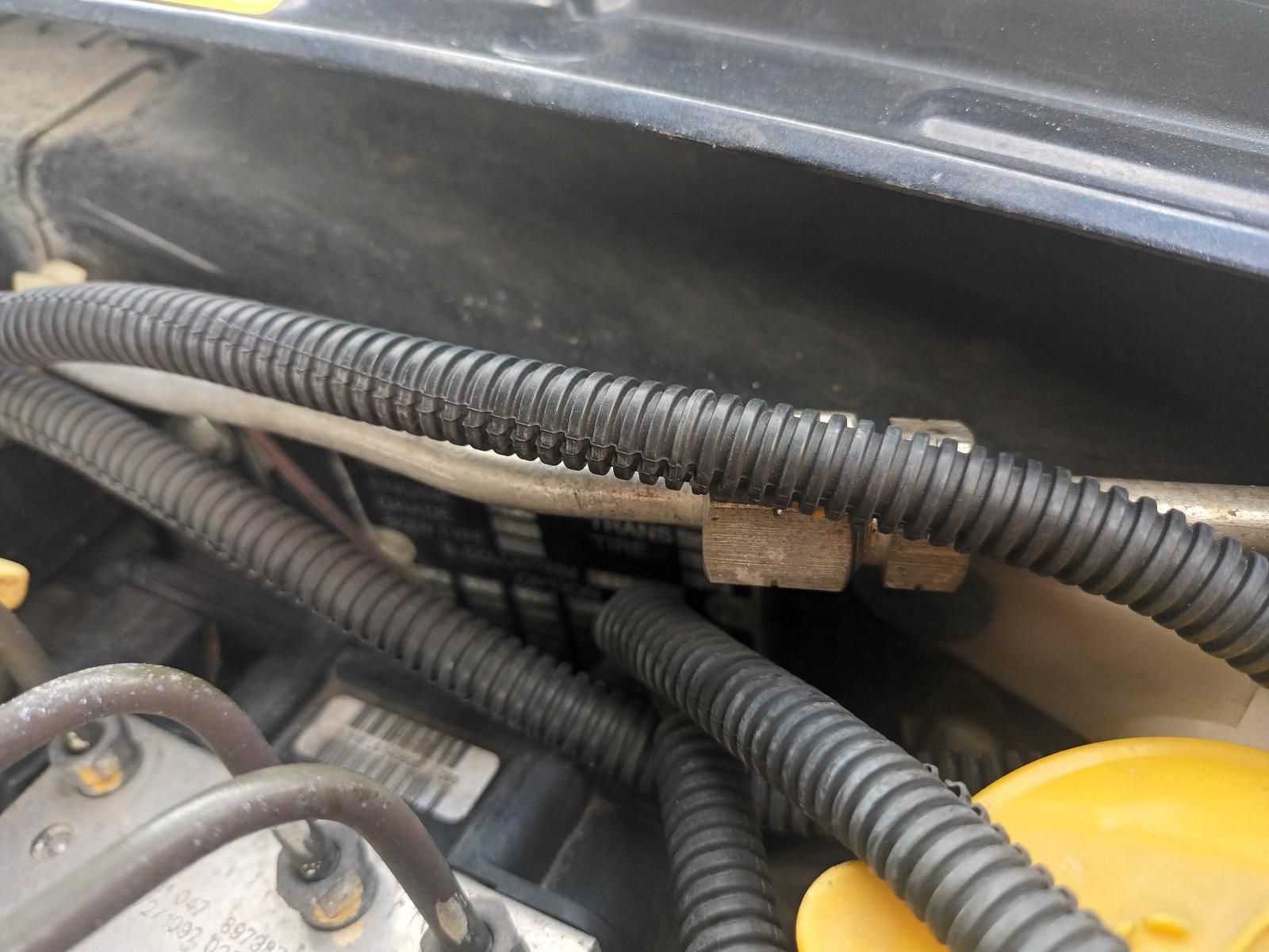 A Close Up of a Car Engine with a Yellow Cap — South West 4WD Wreckers In Brisbane, QLD