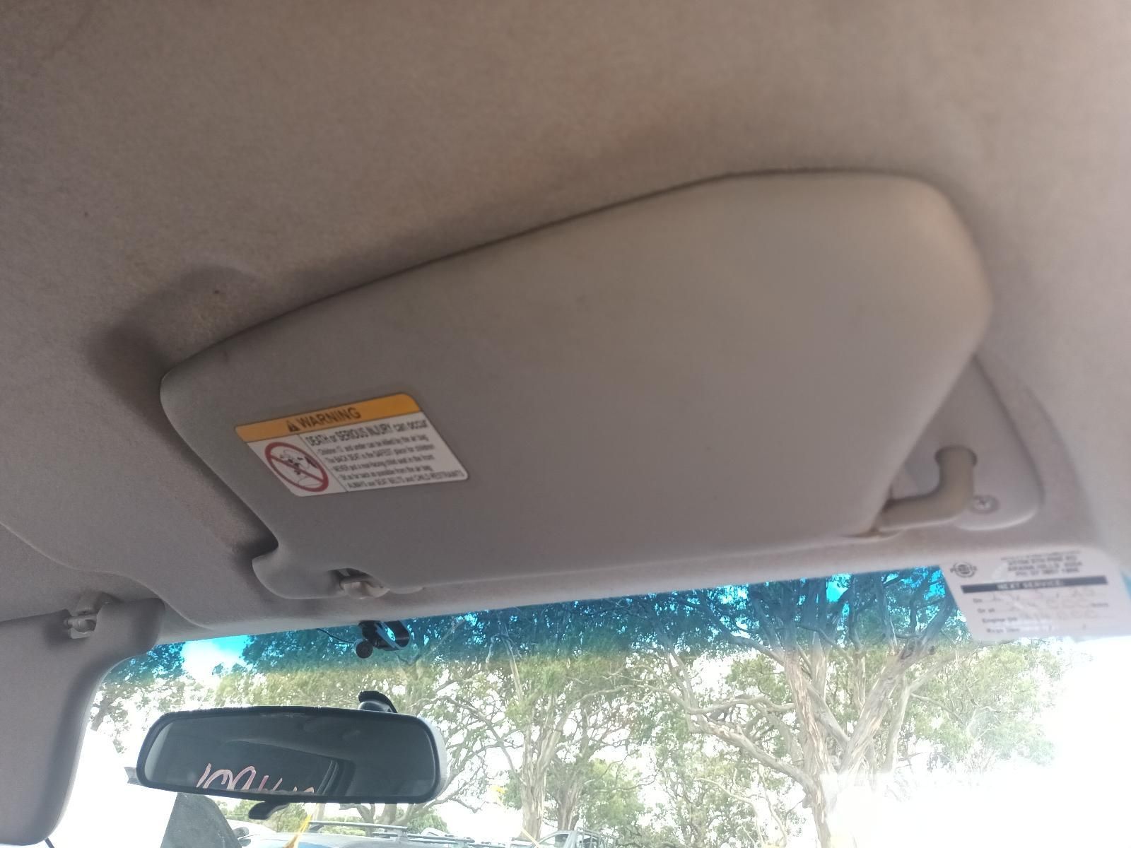 A Sun Visor is Hanging from the Ceiling of a Car — South West 4WD Wreckers In Brisbane, QLD