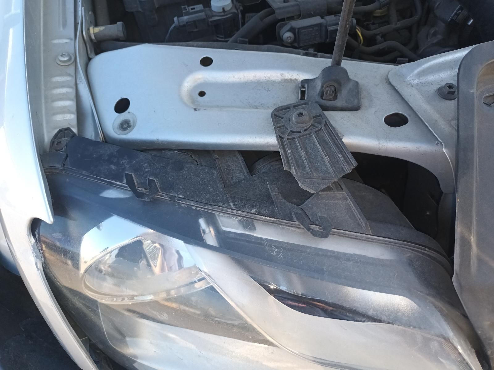 A Close Up of a Car's Headlight with the Hood Open — South West 4WD Wreckers in Harristown, QLD