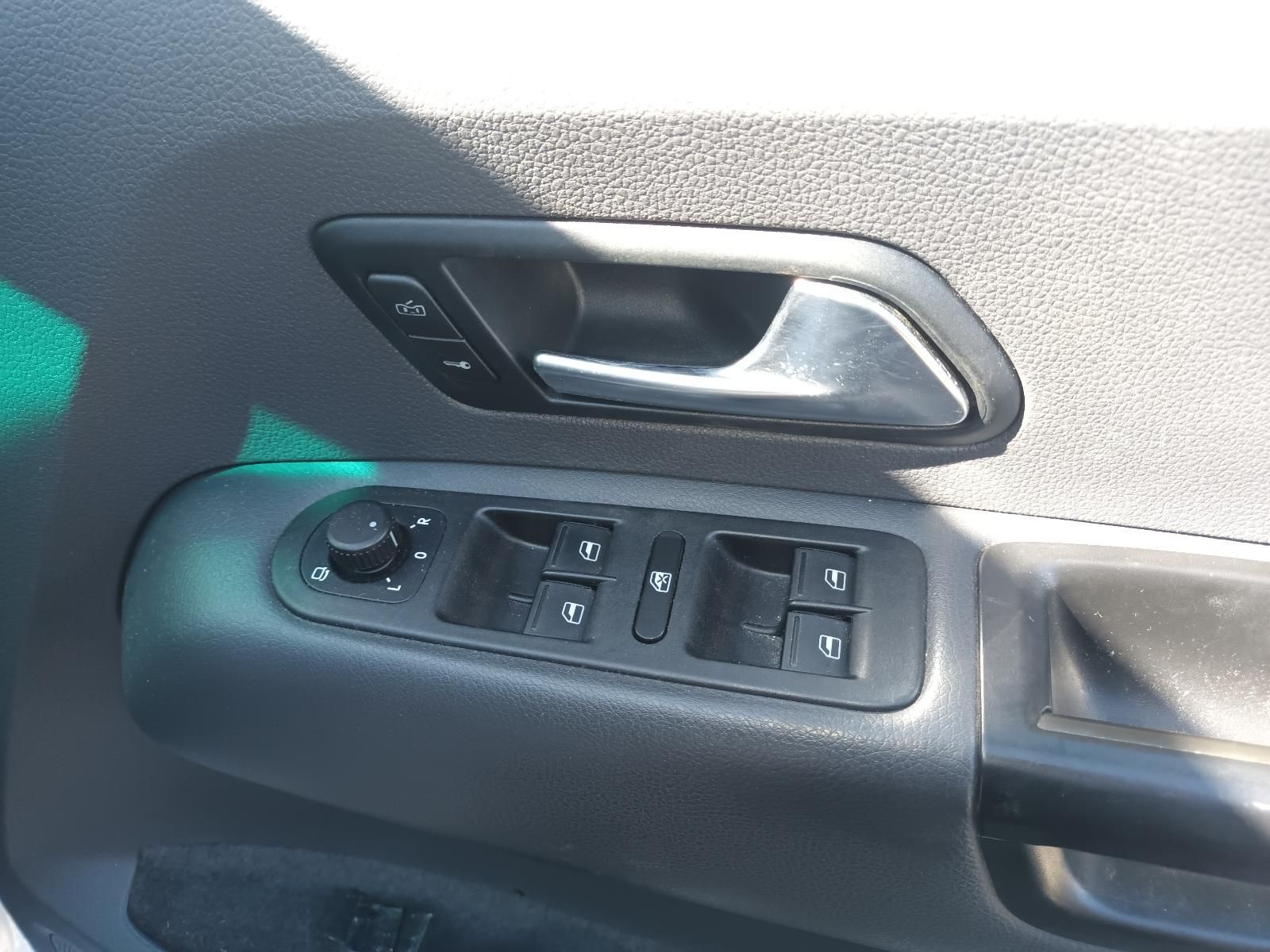 A Close Up of a Car Door with a Window Switch — South West 4WD Wreckers in Harristown, QLD