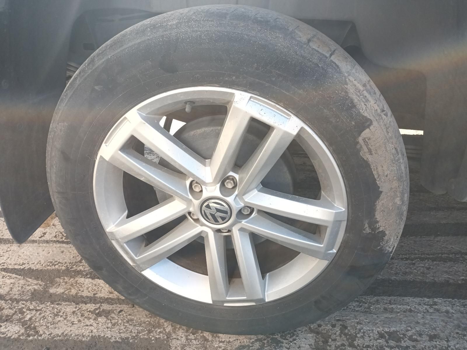 A Close Up of a Car Wheel with a Volkswagen Logo on It — South West 4WD Wreckers in Harristown, QLD