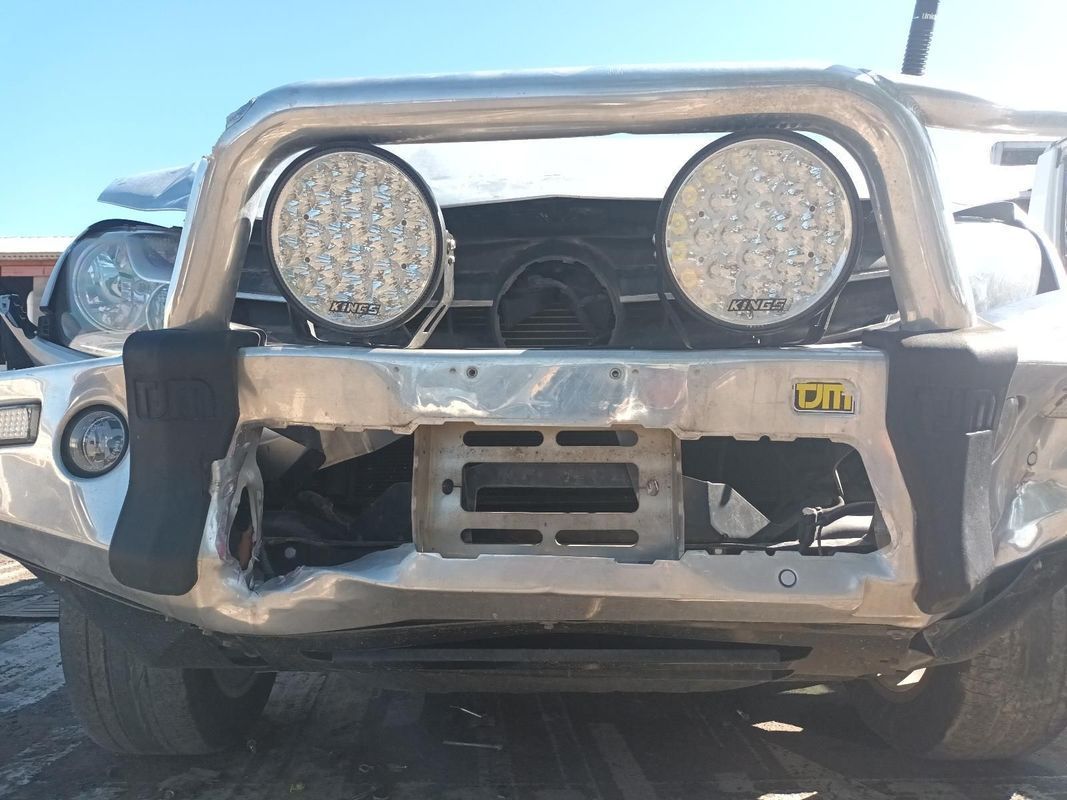 The Front of a Silver Truck with a Bumper and Lights on It — South West 4WD Wreckers in Harristown, QLD