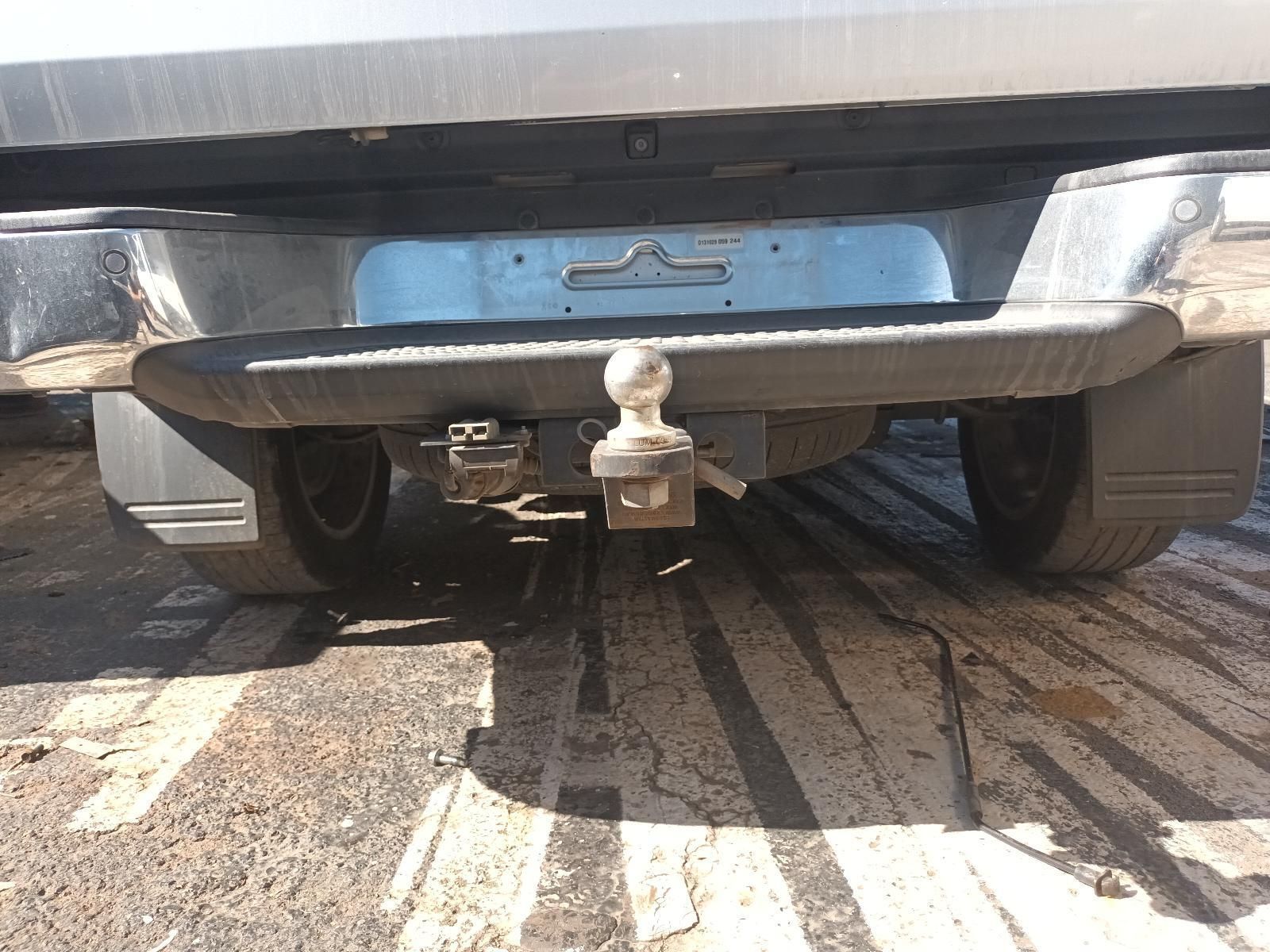 The Back of a Silver Truck with a Trailer Hitch Attached to It — South West 4WD Wreckers in Harristown, QLD