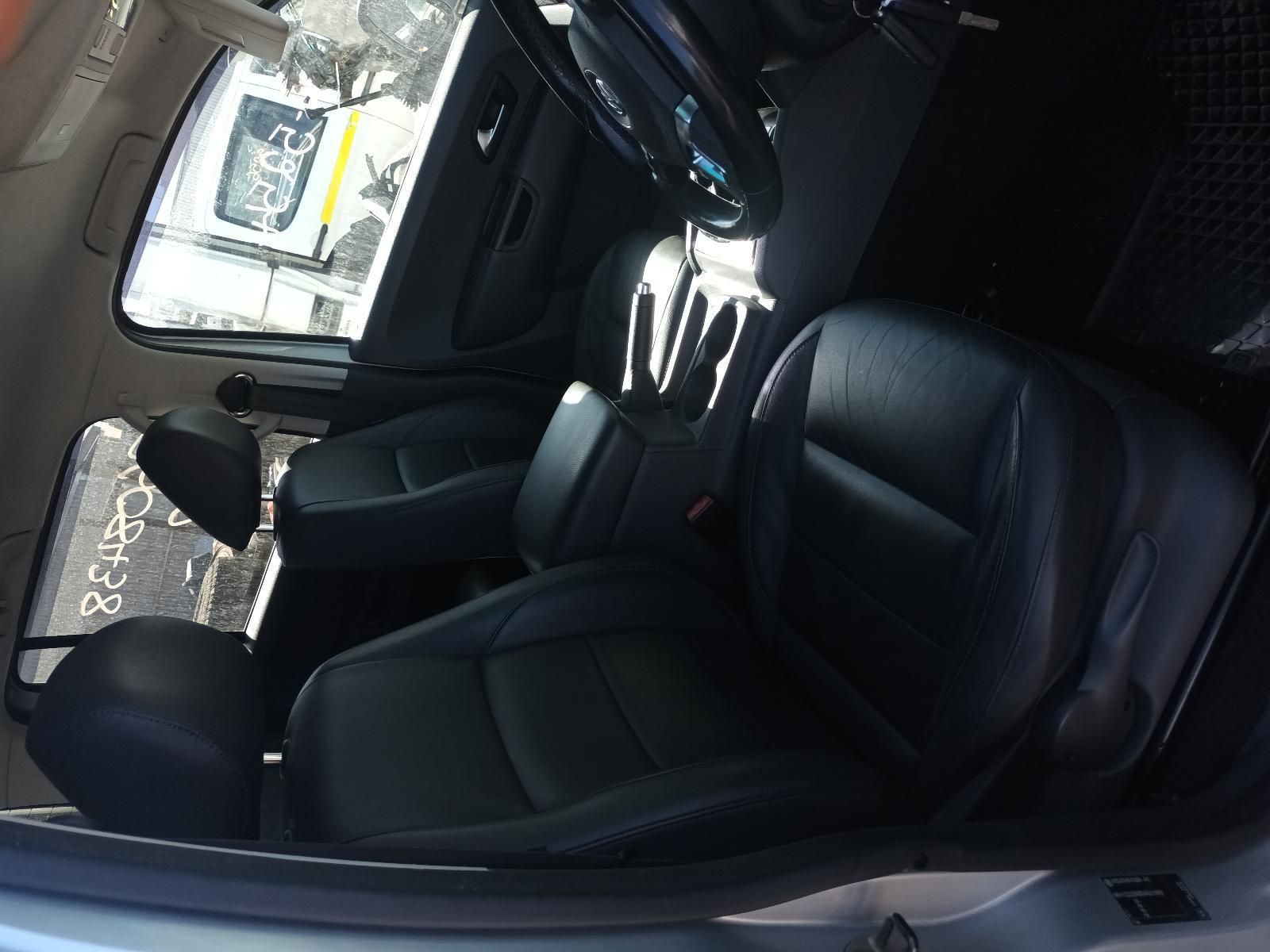 The Inside of a Silver Car with Black Leather Seats and a Steering Wheel — South West 4WD Wreckers in Harristown, QLD