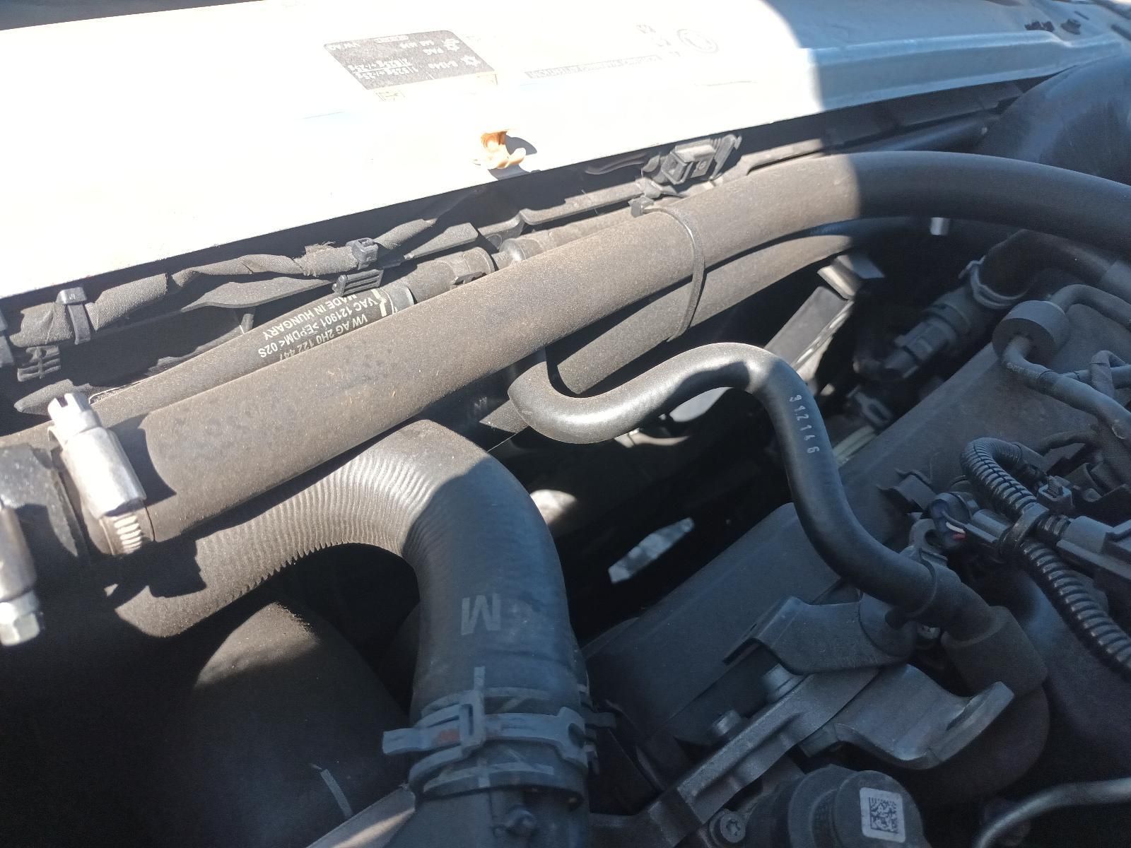 A Close Up of a Car Engine with a Hose — South West 4WD Wreckers in Harristown, QLD