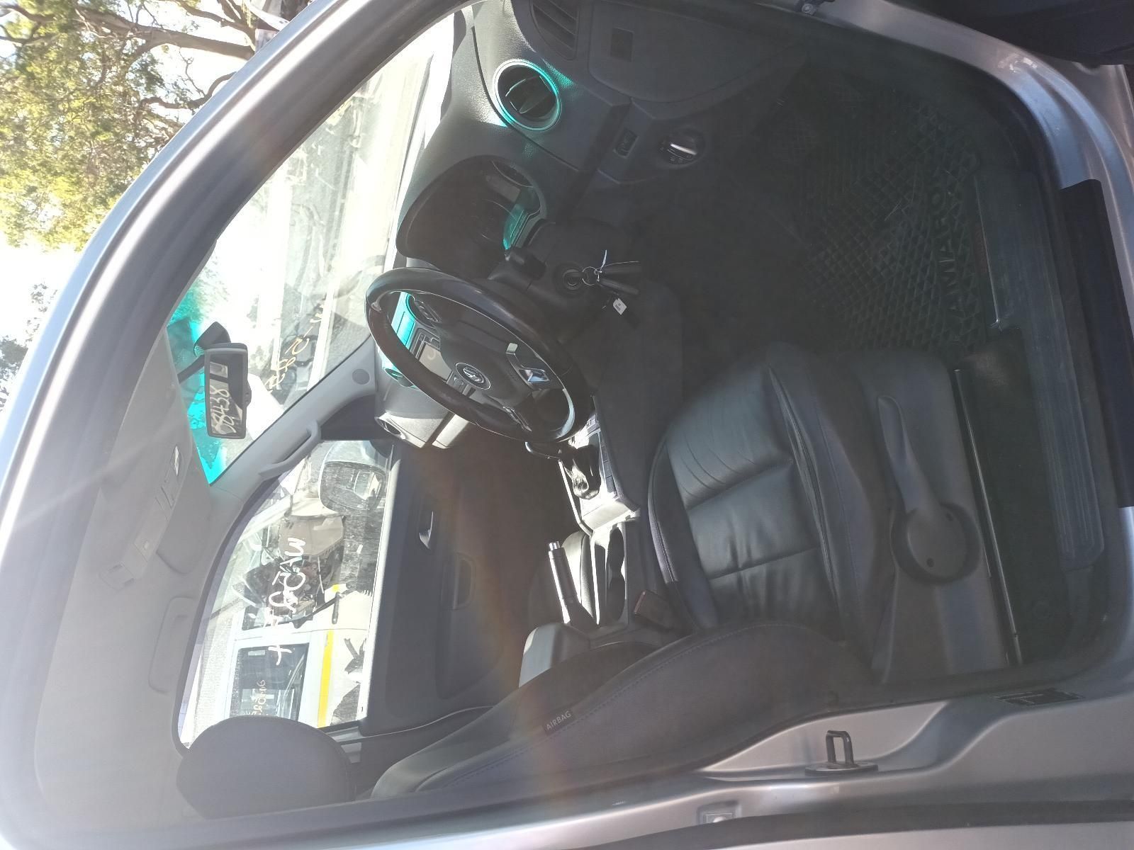 A Car is Parked with the Door Open and the Steering Wheel is Visible — South West 4WD Wreckers in Harristown, QLD