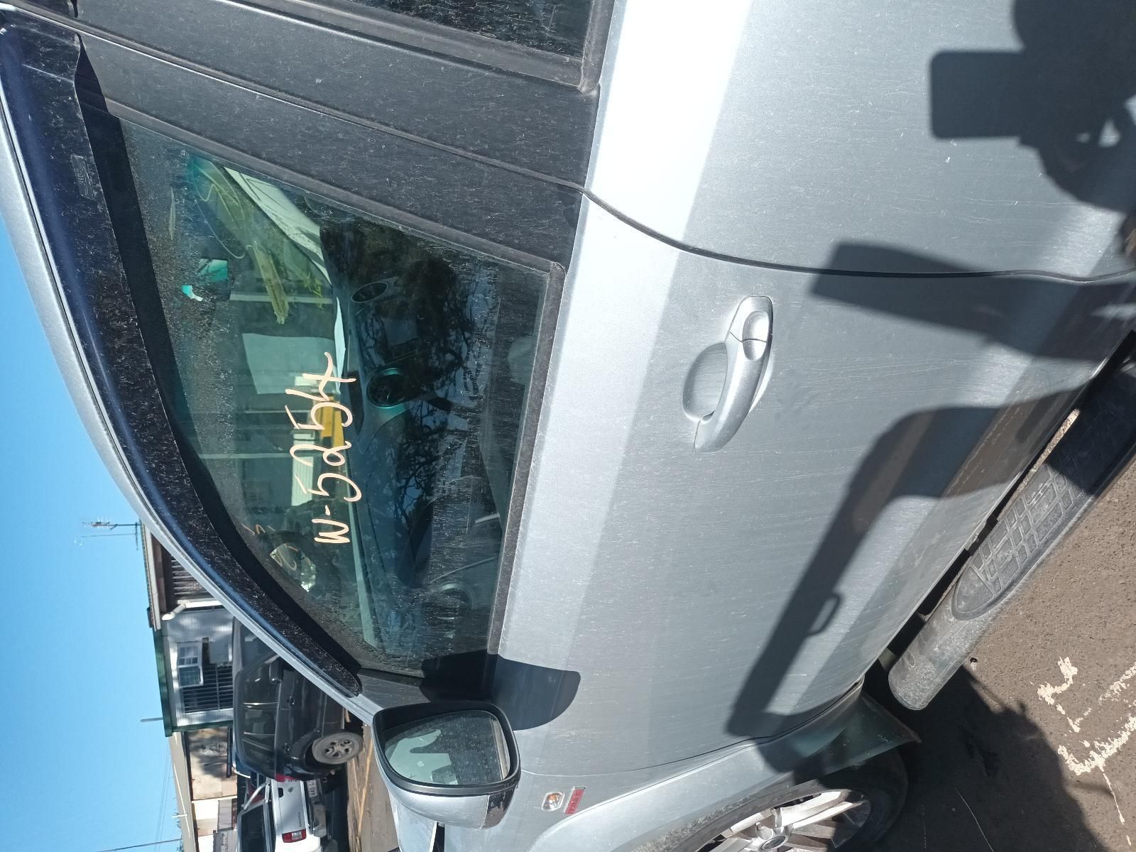 A Silver Car is Parked on the Side of the Road — South West 4WD Wreckers in Harristown, QLD