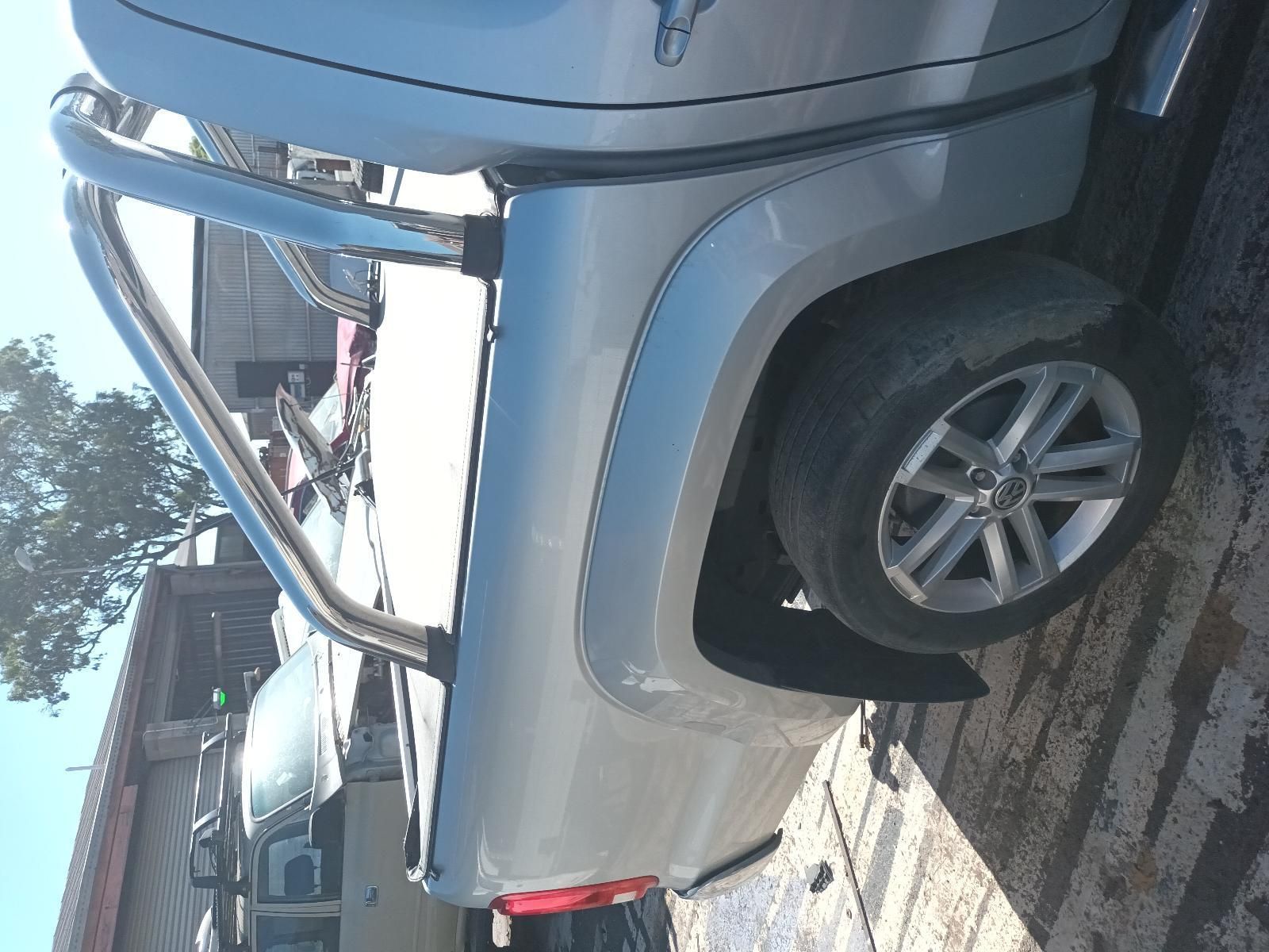 A Silver Truck is Parked on the Side of the Road — South West 4WD Wreckers in Harristown, QLD