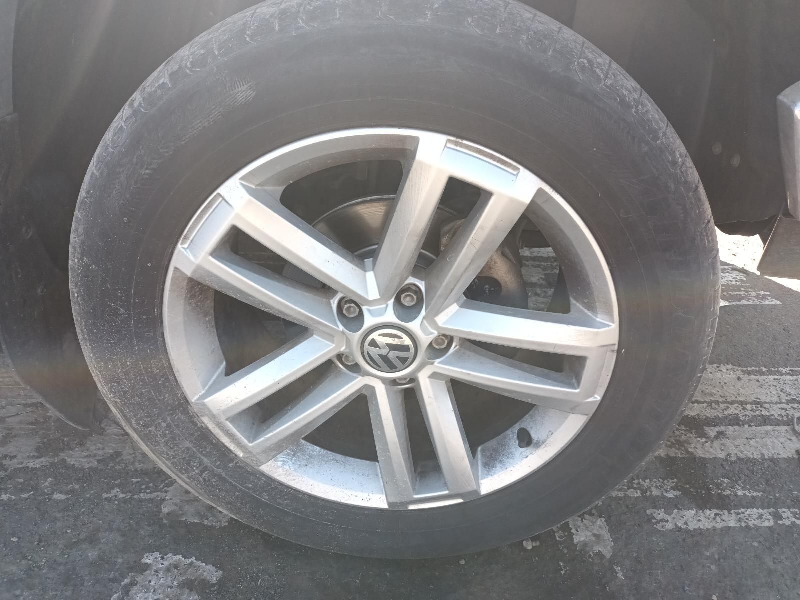 A Close Up of a Car Wheel with a Volkswagen Logo on It — South West 4WD Wreckers in Harristown, QLD