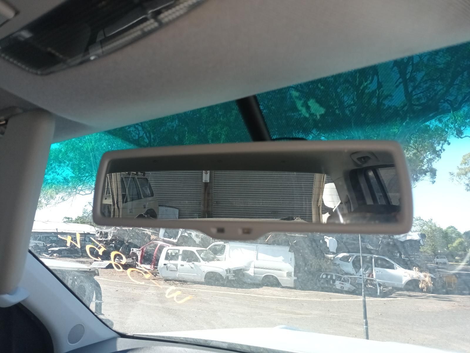 A Rear View Mirror in a Car with a Lot of Cars in the Background — South West 4WD Wreckers in Harristown, QLD