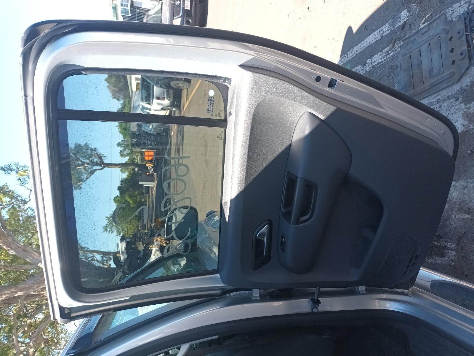 The Back Door of a Silver Car is Open — South West 4WD Wreckers in Harristown, QLD