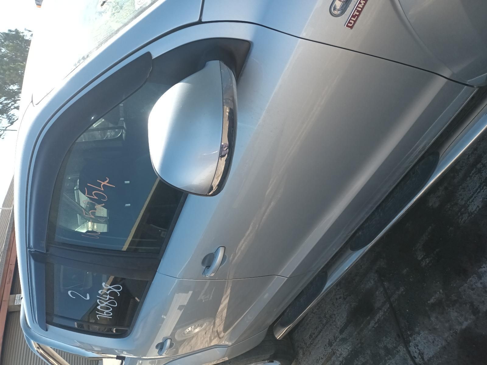 A Silver Car is Parked on the Side of the Road — South West 4WD Wreckers in Harristown, QLD