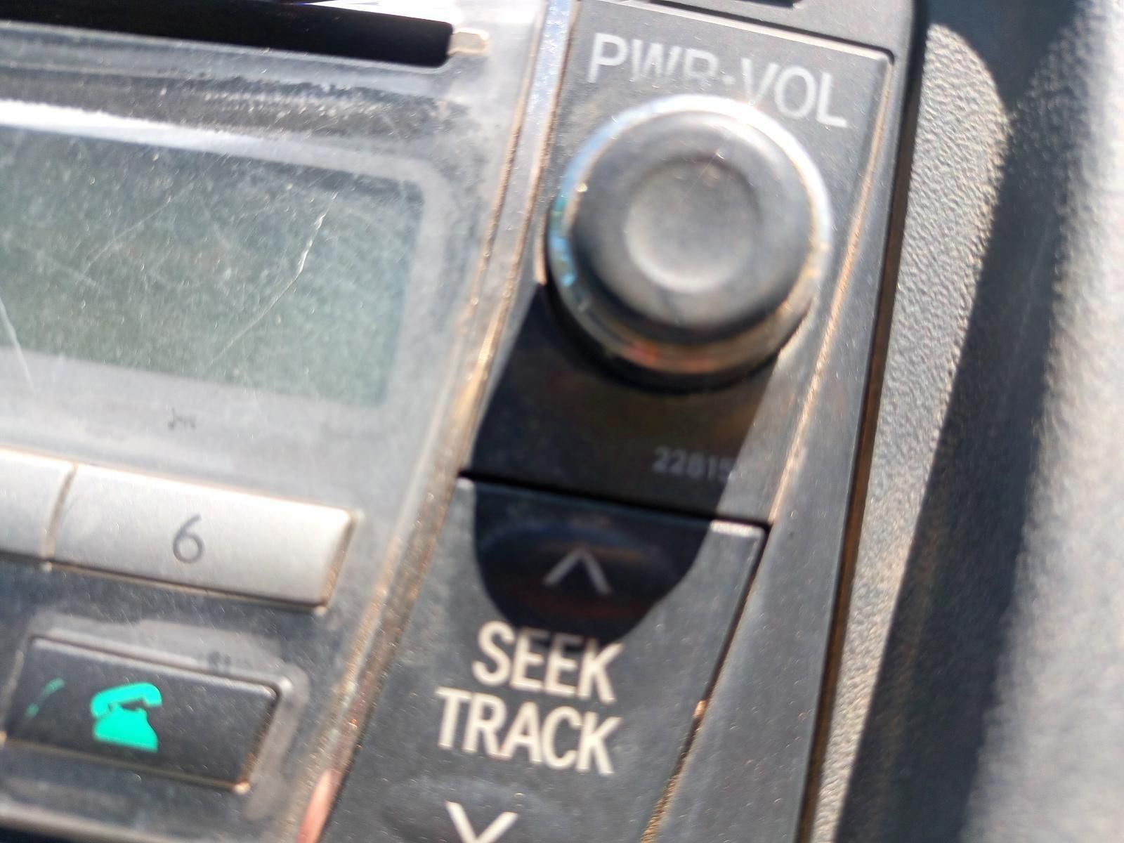 A Close Up of a Seek Track Button on a Car Radio — South West 4WD Wreckers in Harristown, QLD