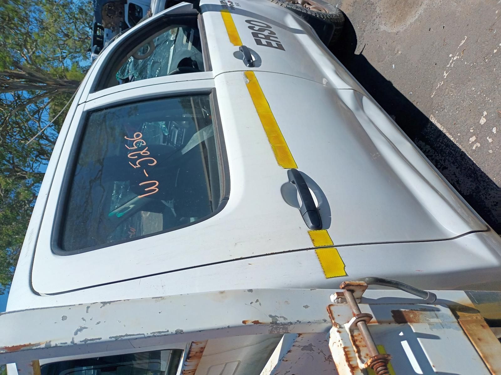 A White Truck is Parked on the Side of the Road — South West 4WD Wreckers in Harristown, QLD