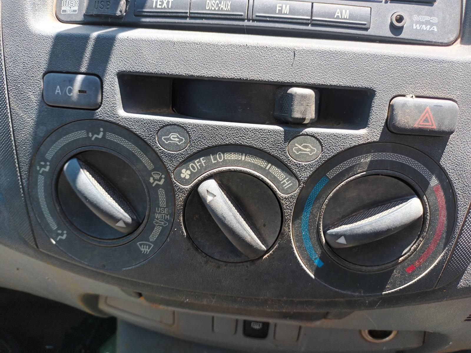 A Close Up of a Car Dashboard with a Few Buttons on It — South West 4WD Wreckers in Harristown, QLD